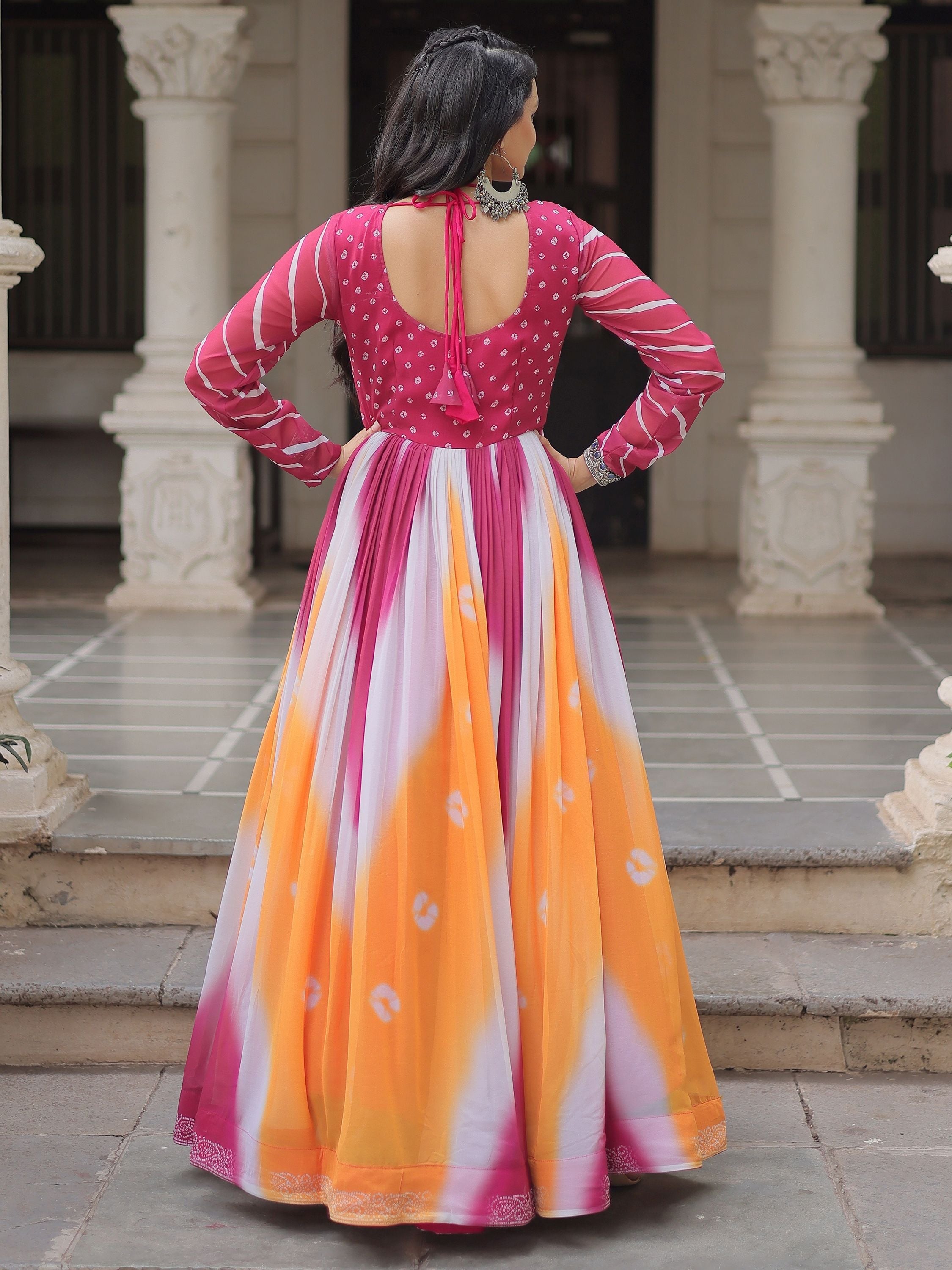 Pink georgette Bandhej print Gamthi embroidery mirror work gown