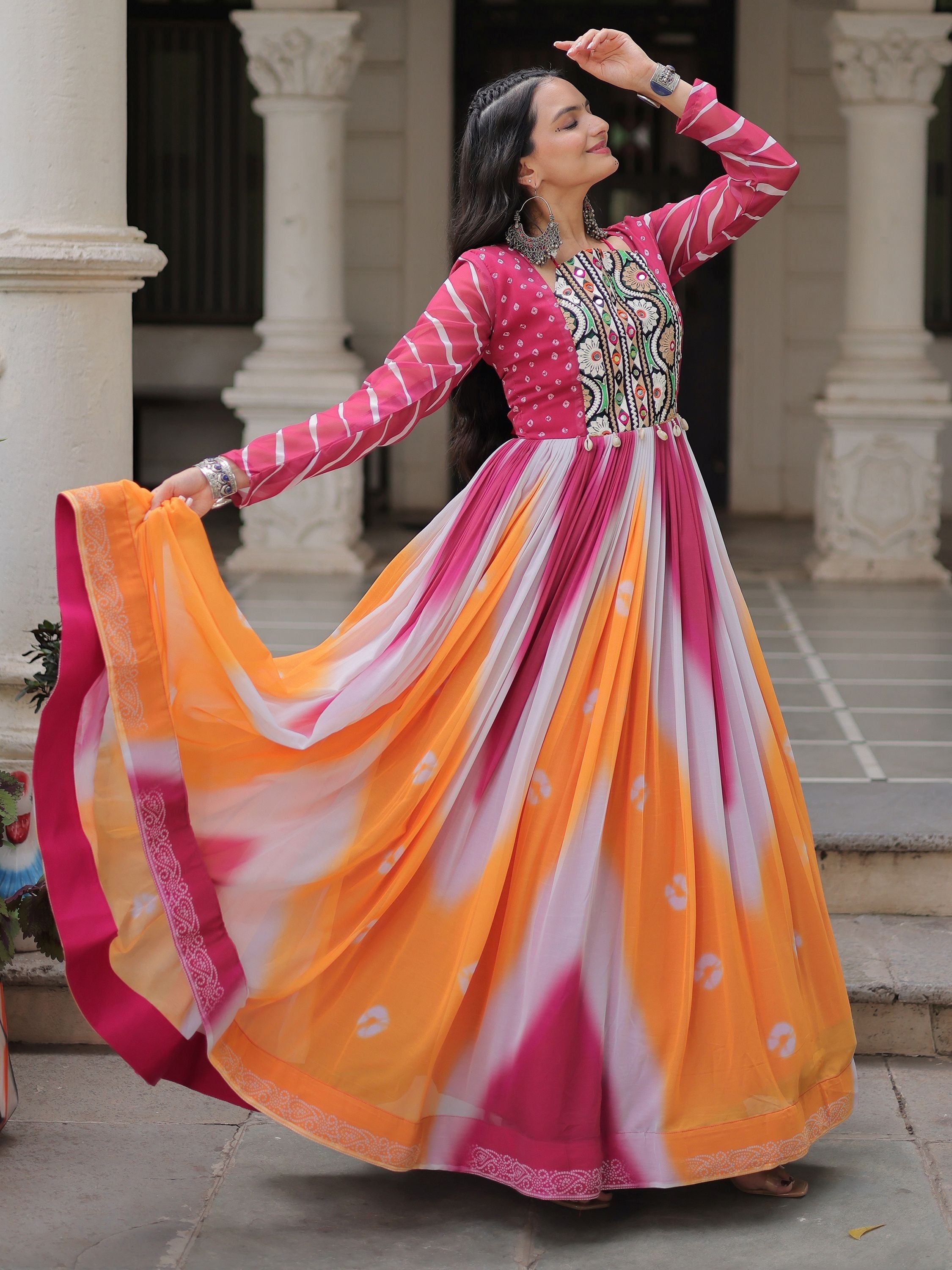 Pink georgette Bandhej print Gamthi embroidery mirror work gown