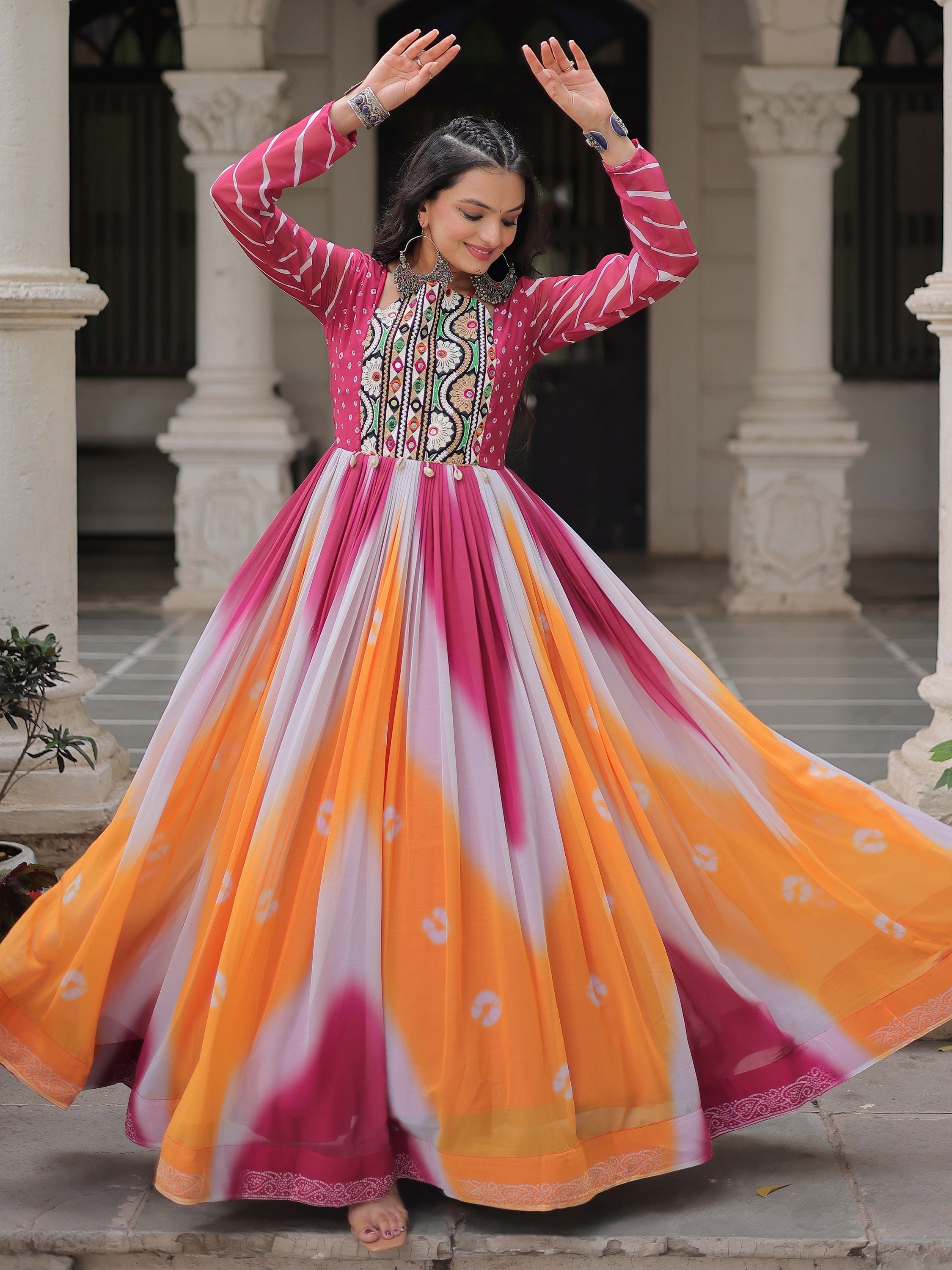 Pink georgette Bandhej print Gamthi embroidery mirror work gown