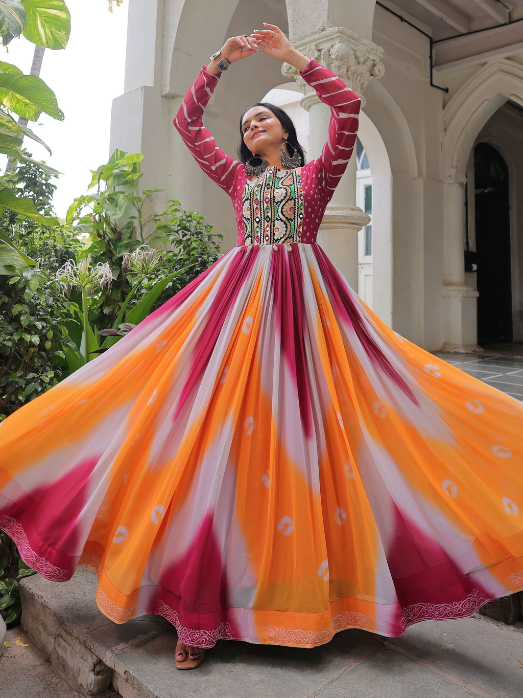 Pink georgette Bandhej print Gamthi embroidery mirror work gown
