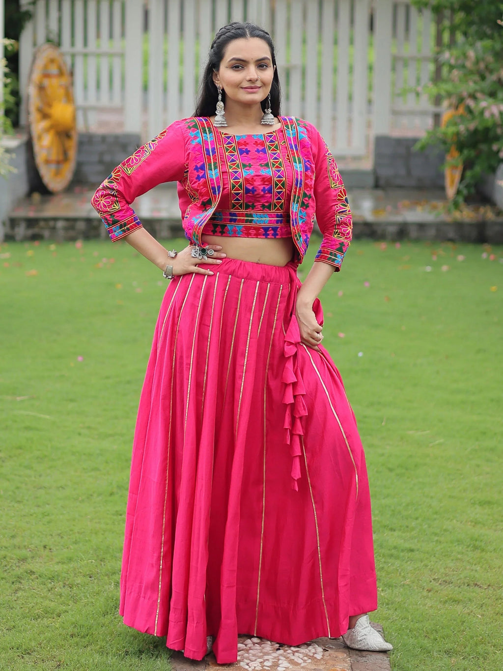 Pink lehenga choli with Kutchi Gamthi embroidery and Gota Patti lace