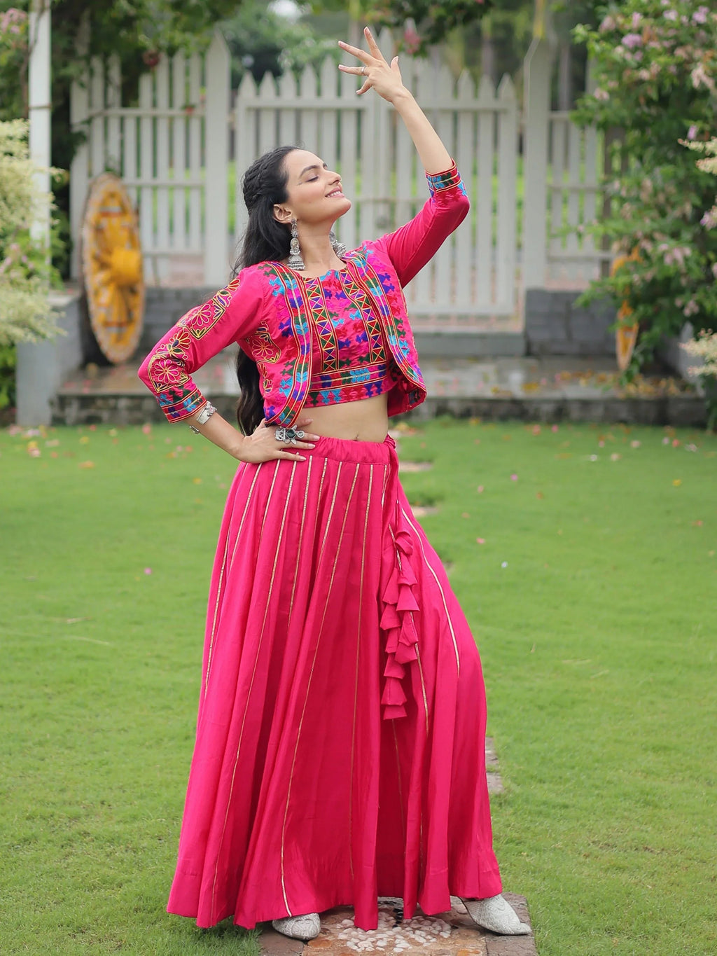 Pink lehenga choli with Kutchi Gamthi embroidery and Gota Patti lace