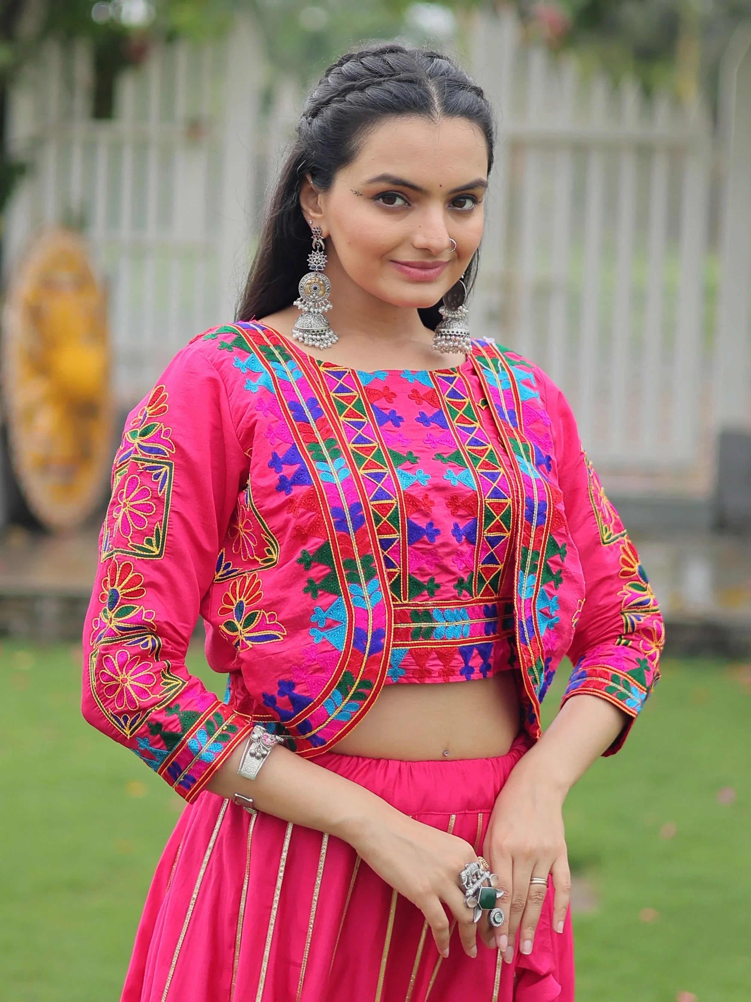 Pink lehenga choli with Kutchi Gamthi embroidery and Gota Patti lace