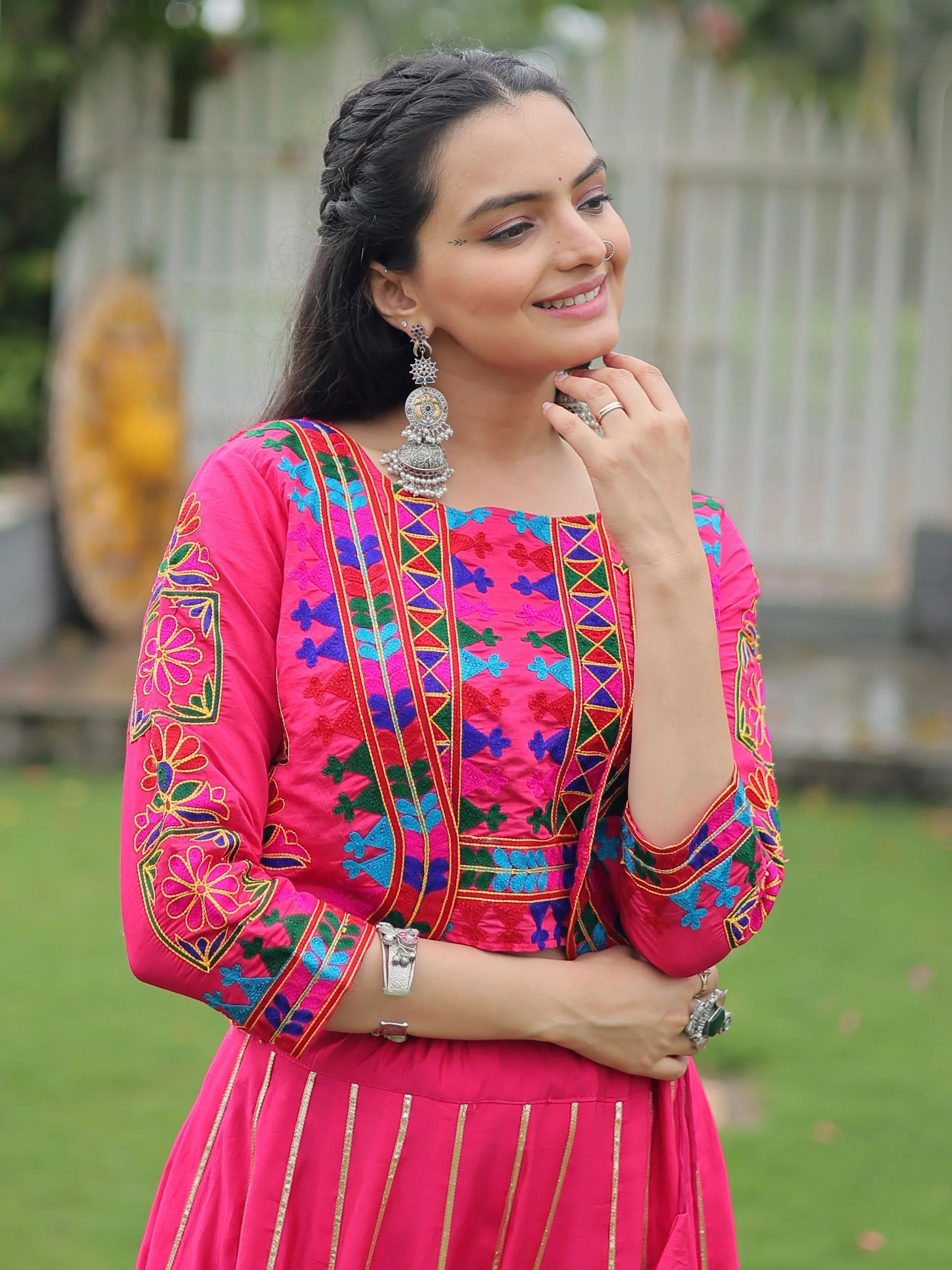 Pink lehenga choli with Kutchi Gamthi embroidery and Gota Patti lace