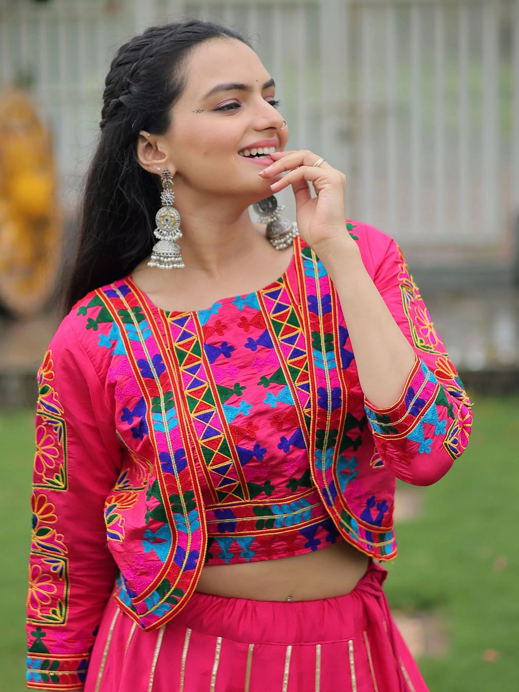 Pink lehenga choli with Kutchi Gamthi embroidery and Gota Patti lace
