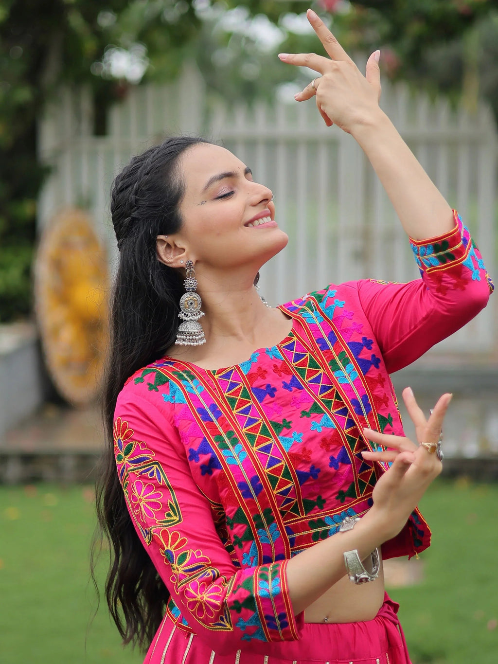 Pink lehenga choli with Kutchi Gamthi embroidery and Gota Patti lace