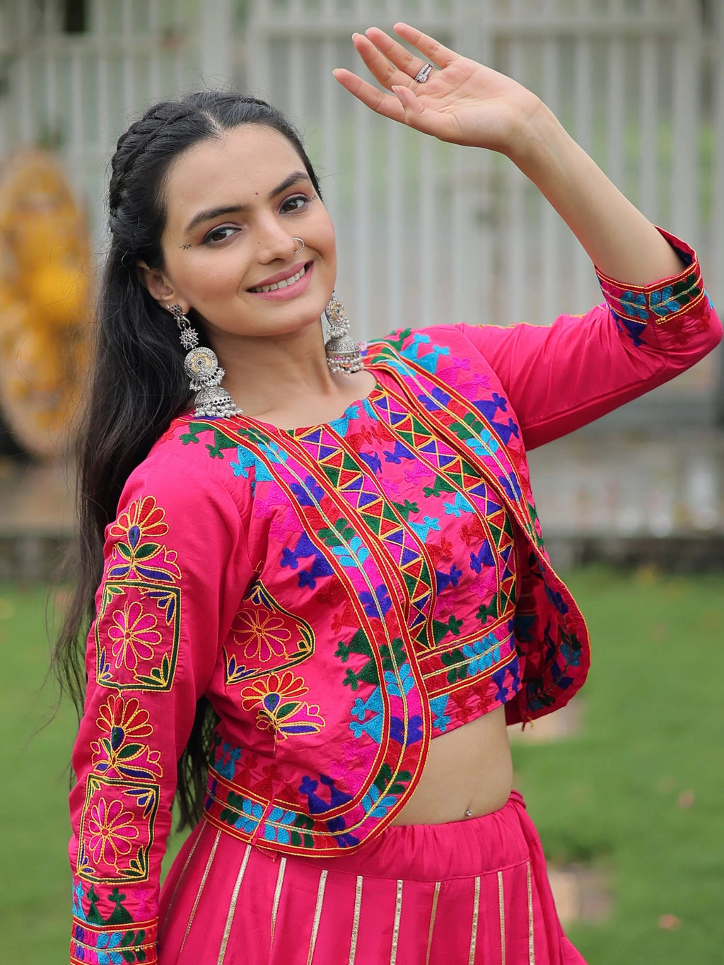 Pink lehenga choli with Kutchi Gamthi embroidery and Gota Patti lace