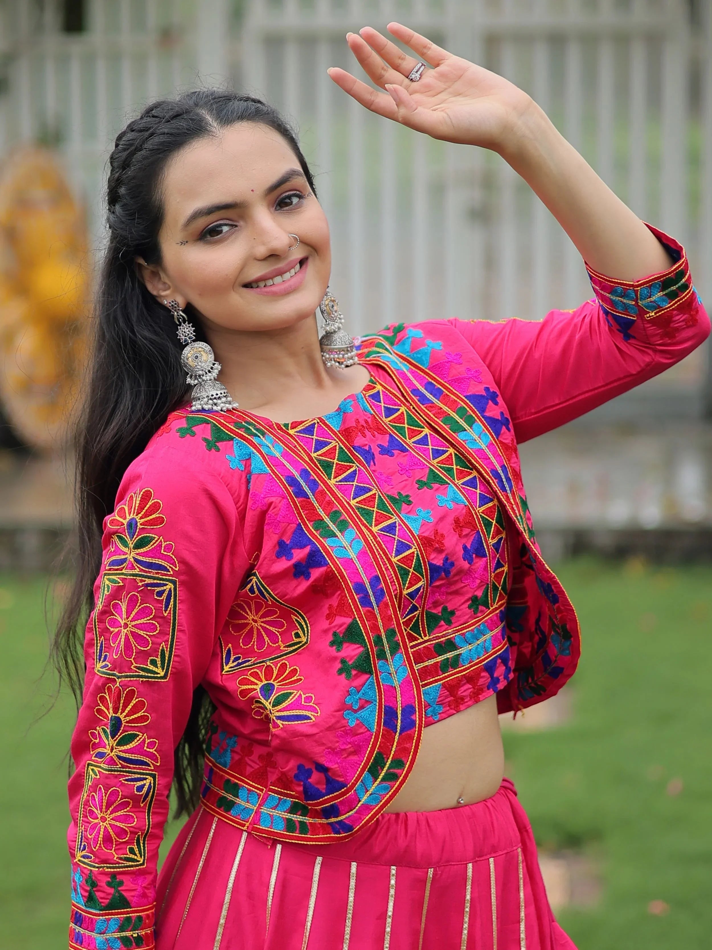 Pink lehenga choli with Kutchi Gamthi embroidery and Gota Patti lace