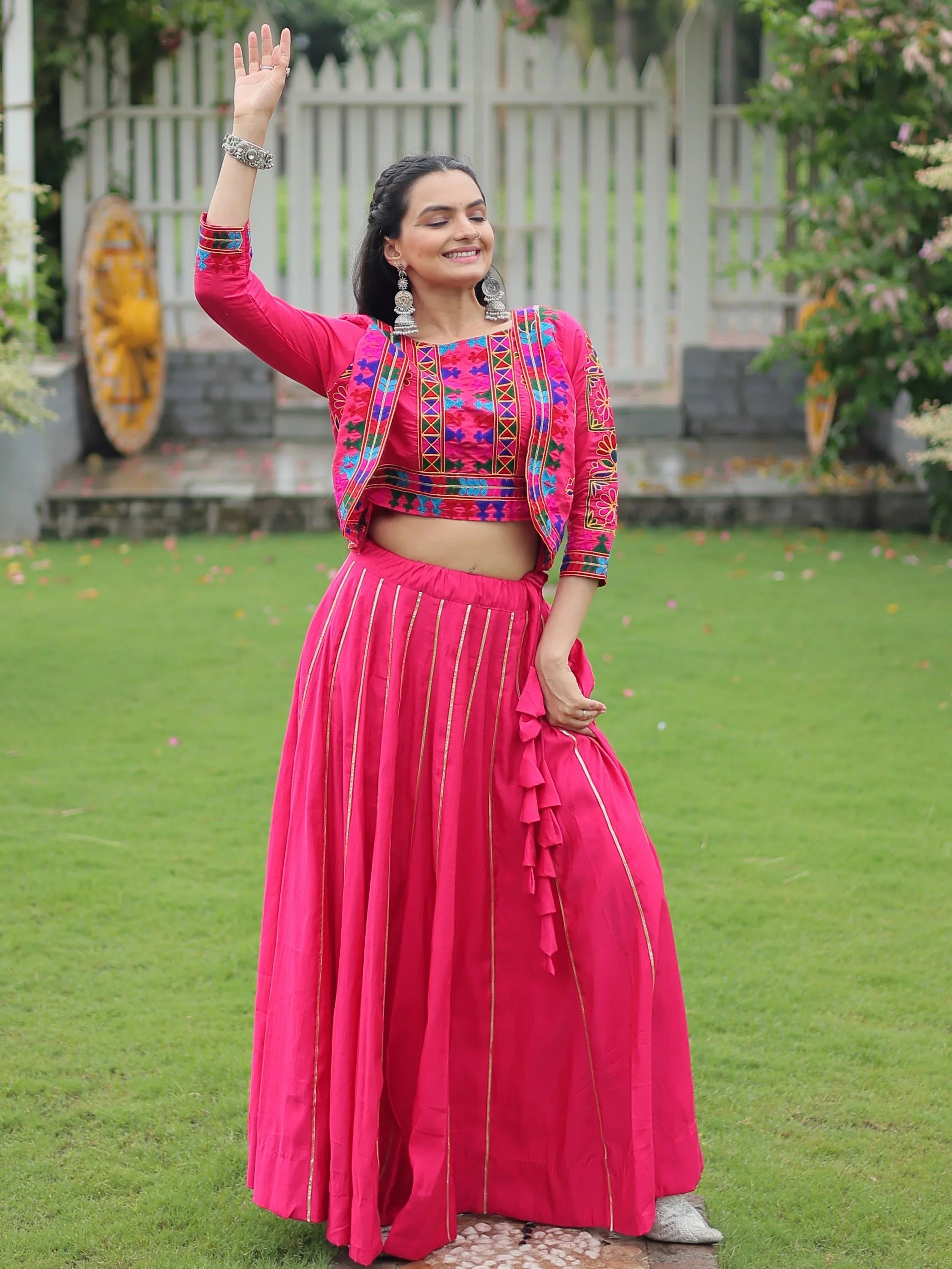 Pink lehenga choli with Kutchi Gamthi embroidery and Gota Patti lace