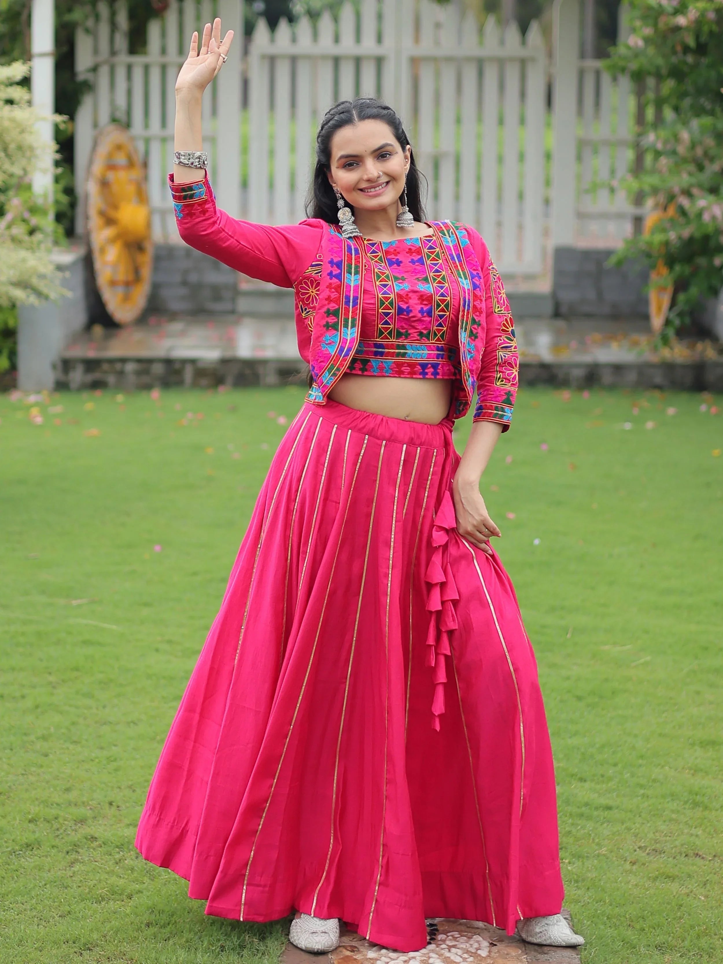Pink lehenga choli with Kutchi Gamthi embroidery and Gota Patti lace