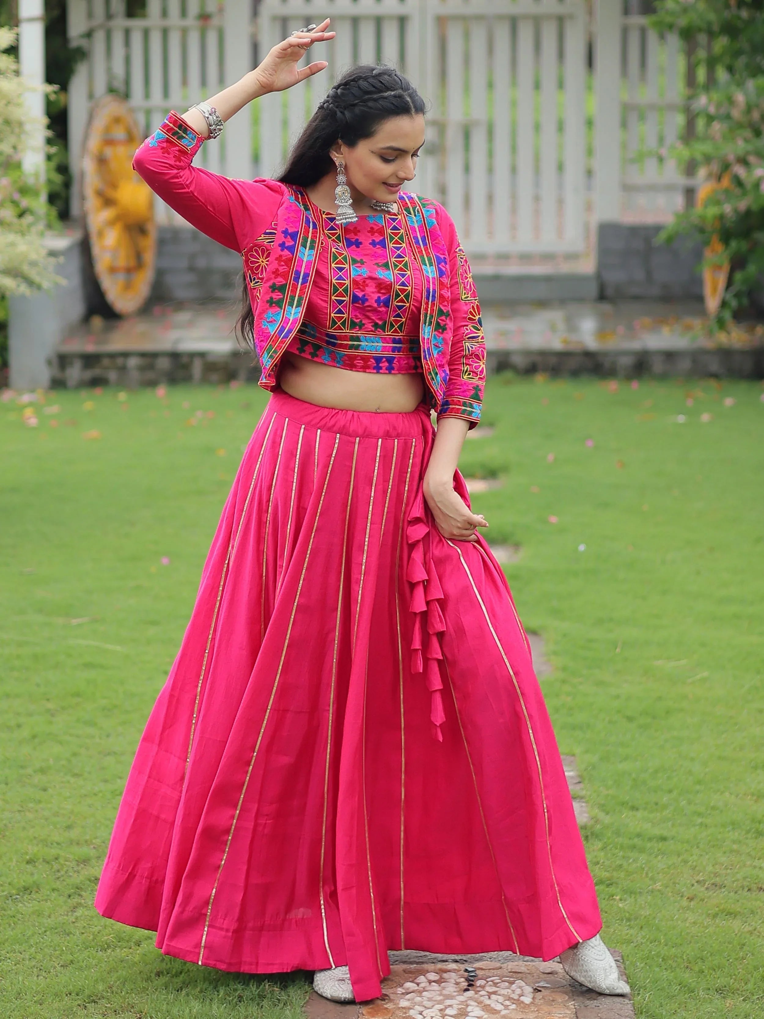 Pink lehenga choli with Kutchi Gamthi embroidery and Gota Patti lace