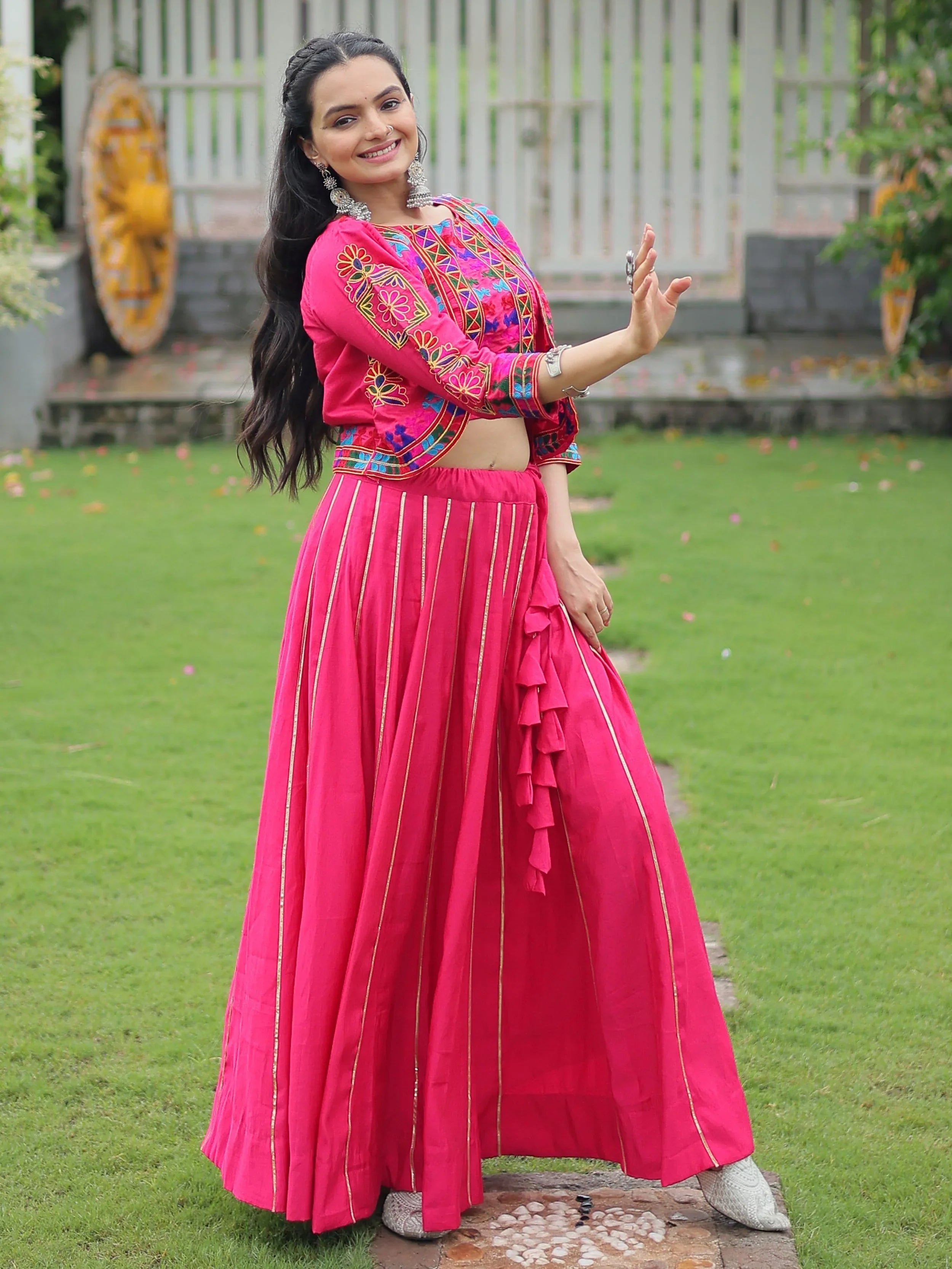 Pink lehenga choli with Kutchi Gamthi embroidery and Gota Patti lace