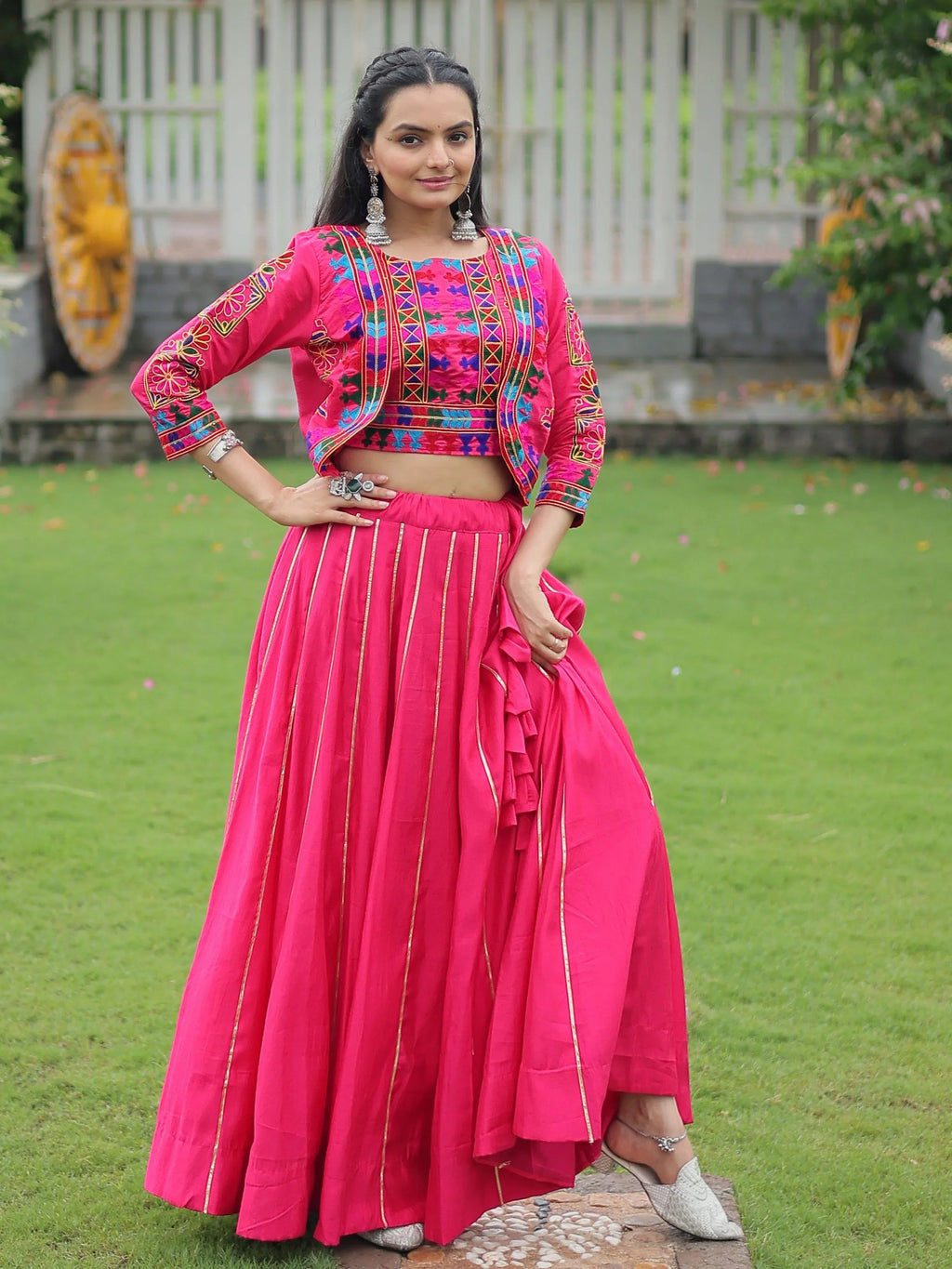 Pink lehenga choli with Kutchi Gamthi embroidery and Gota Patti lace