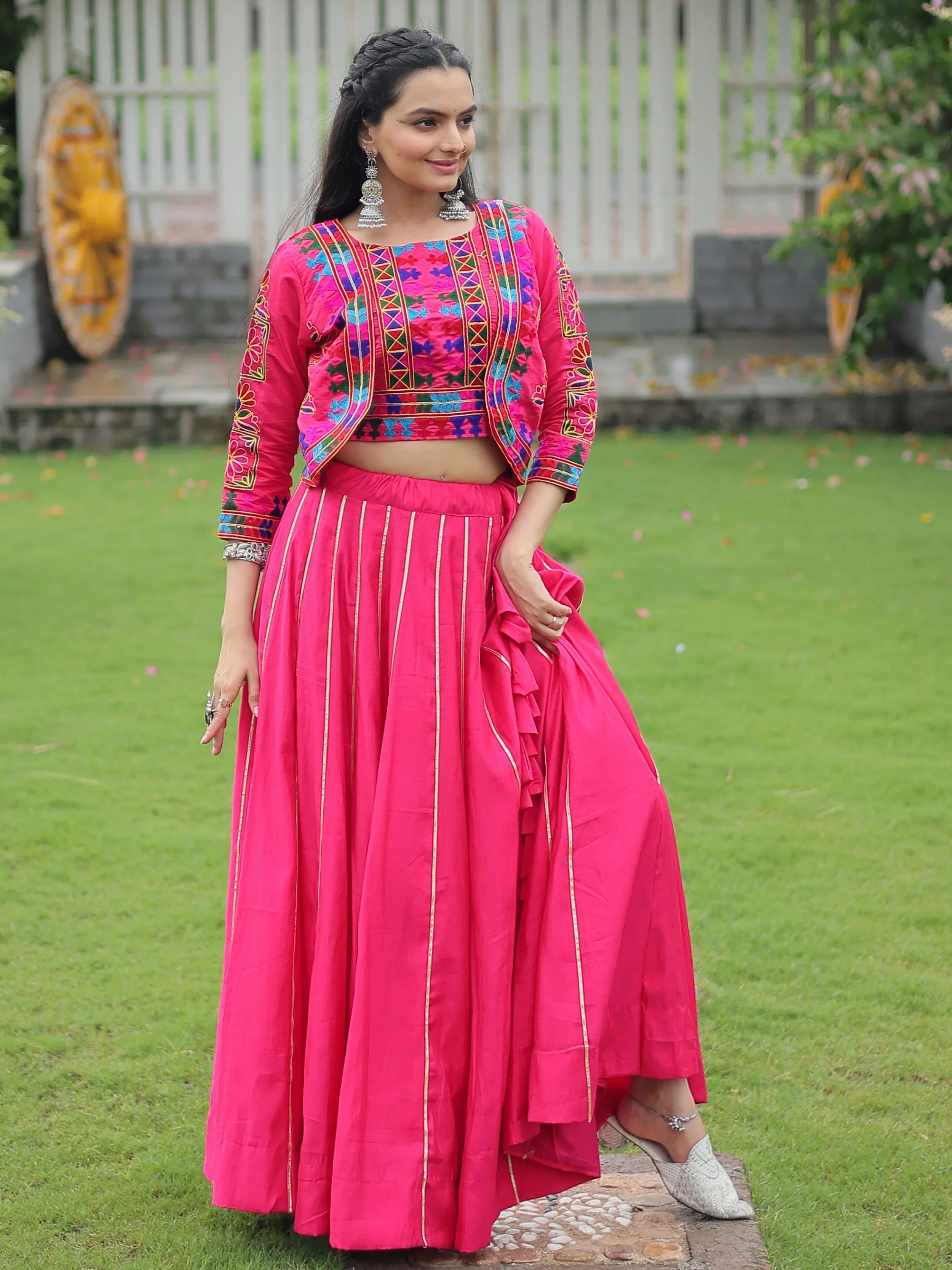 Pink lehenga choli with Kutchi Gamthi embroidery and Gota Patti lace