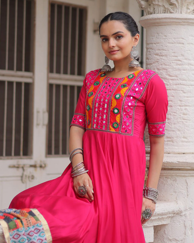 Pink silk gown with thread mirror embroidery and crochet print