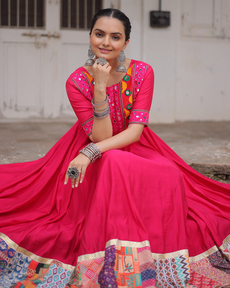 Pink silk gown with thread mirror embroidery and crochet print