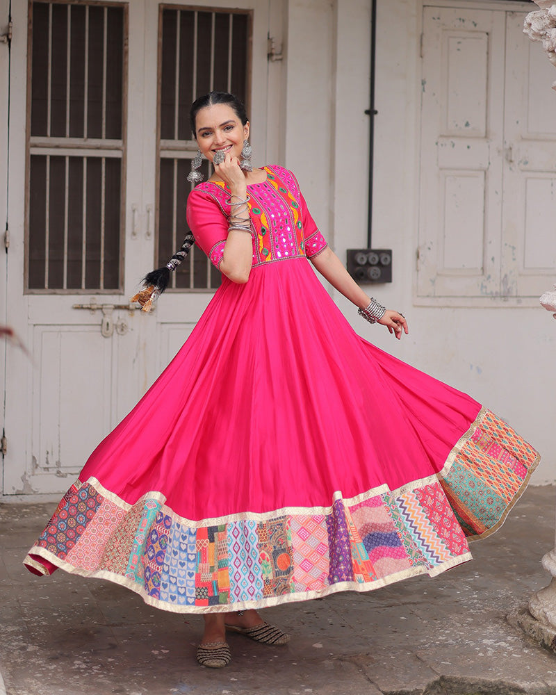 Pink silk gown with thread mirror embroidery and crochet print