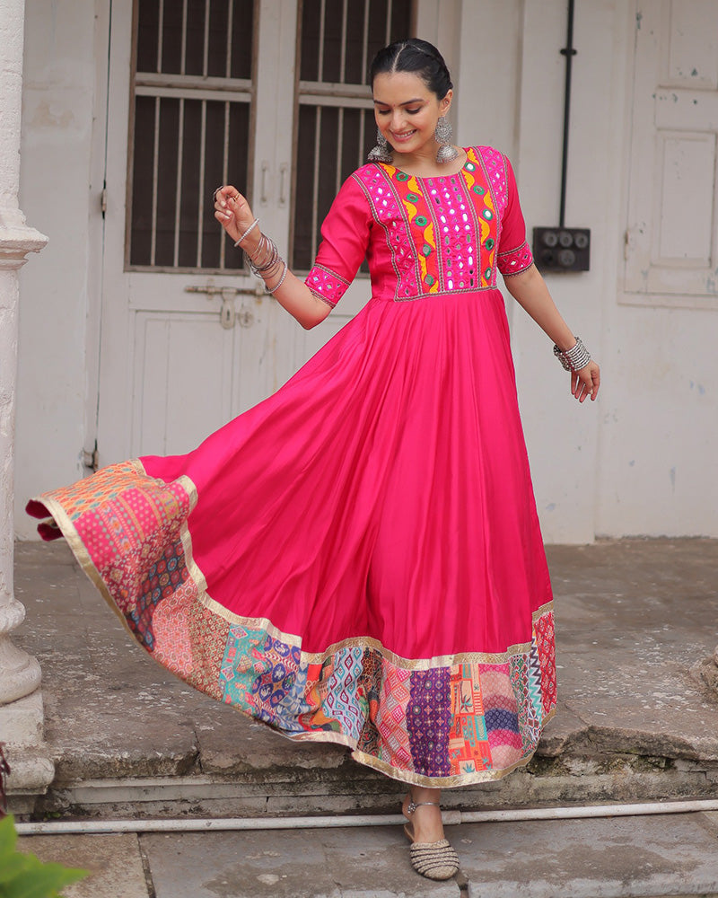 Pink silk gown with thread mirror embroidery and crochet print