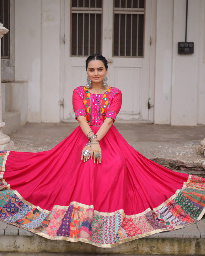 Pink silk gown with thread mirror embroidery and crochet print