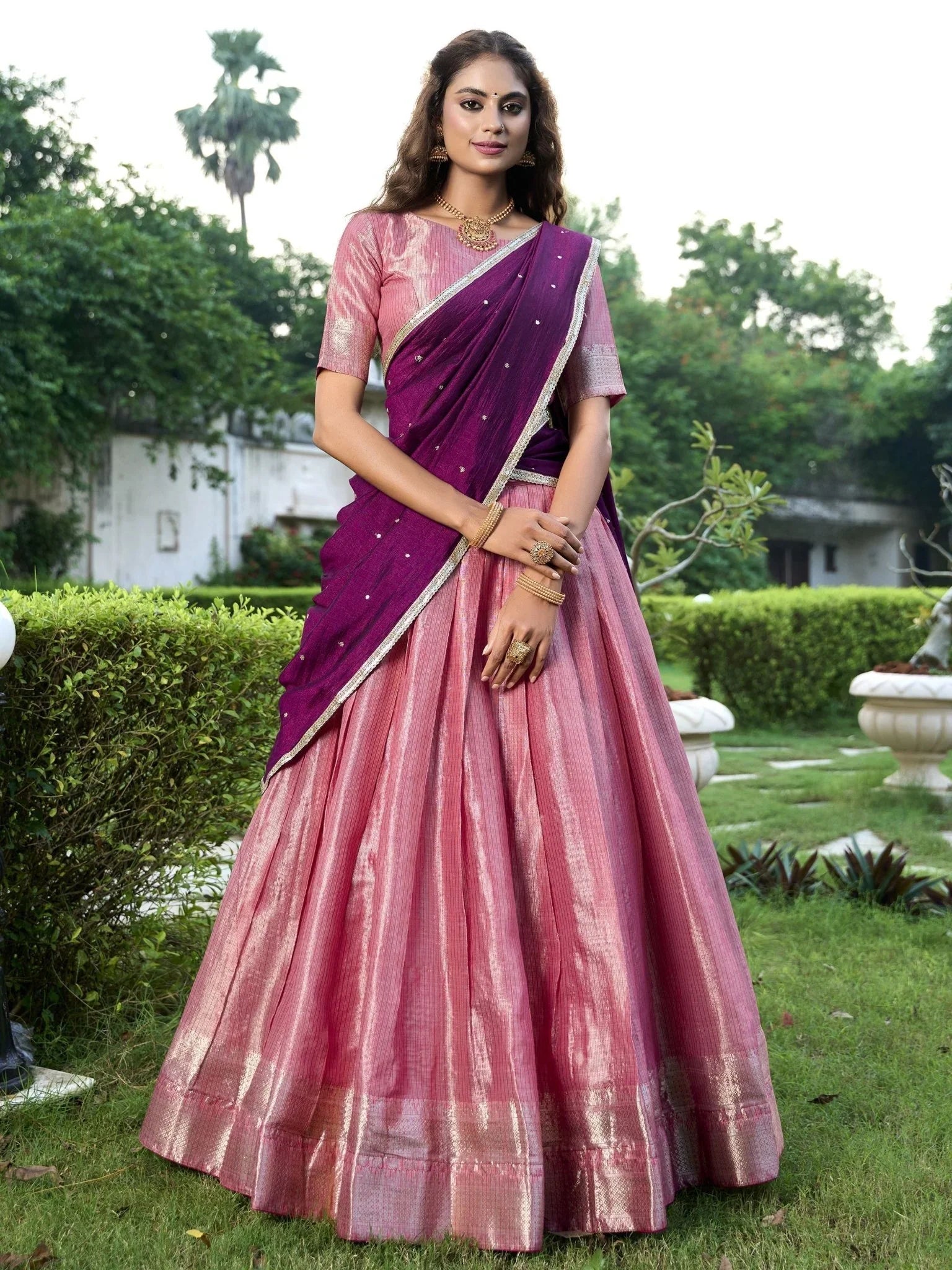 Pink kanchipuram silk lehenga choli with zari weaving and sequins embroidery