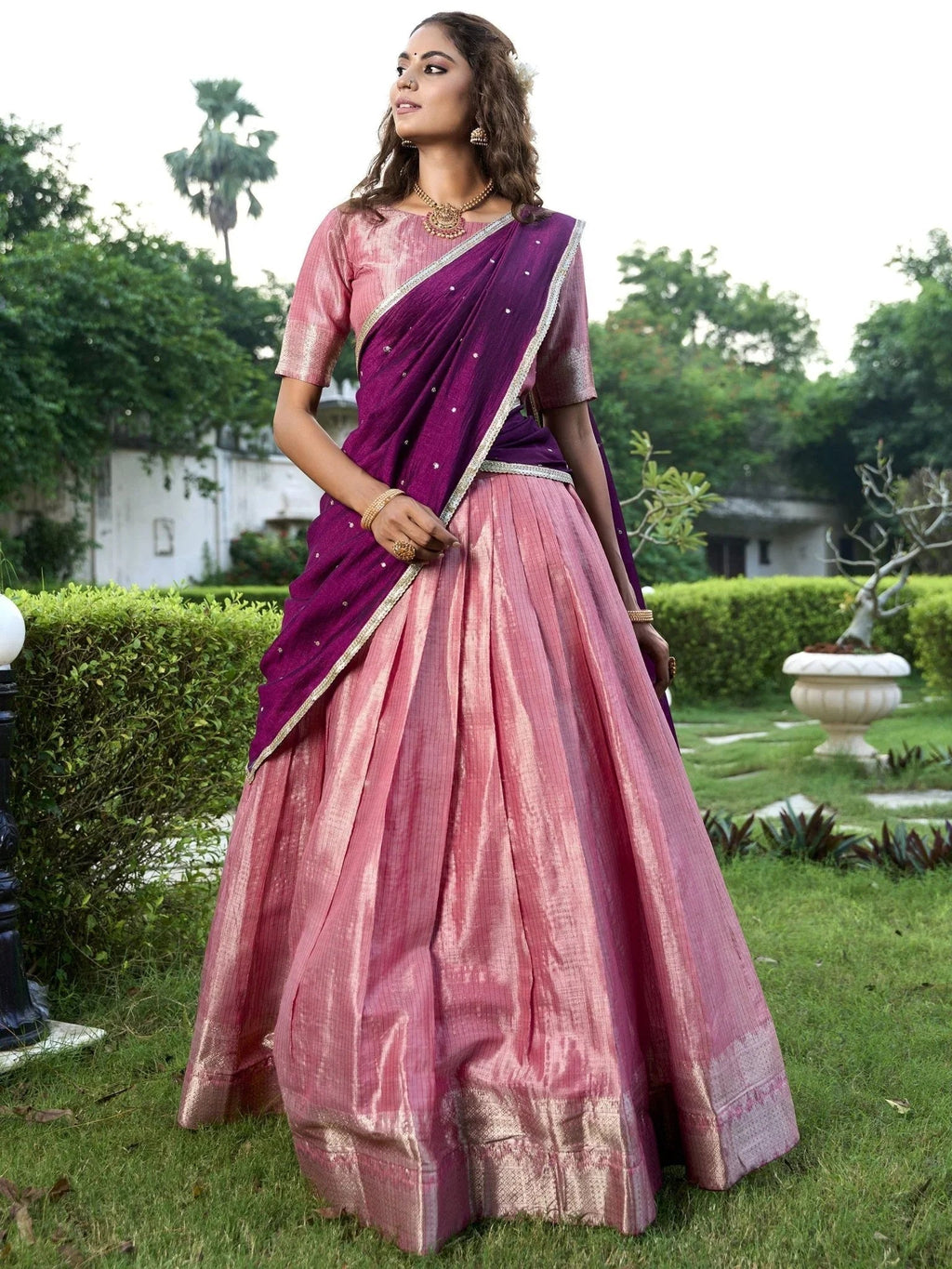 Pink kanchipuram silk lehenga choli with zari weaving and sequins embroidery