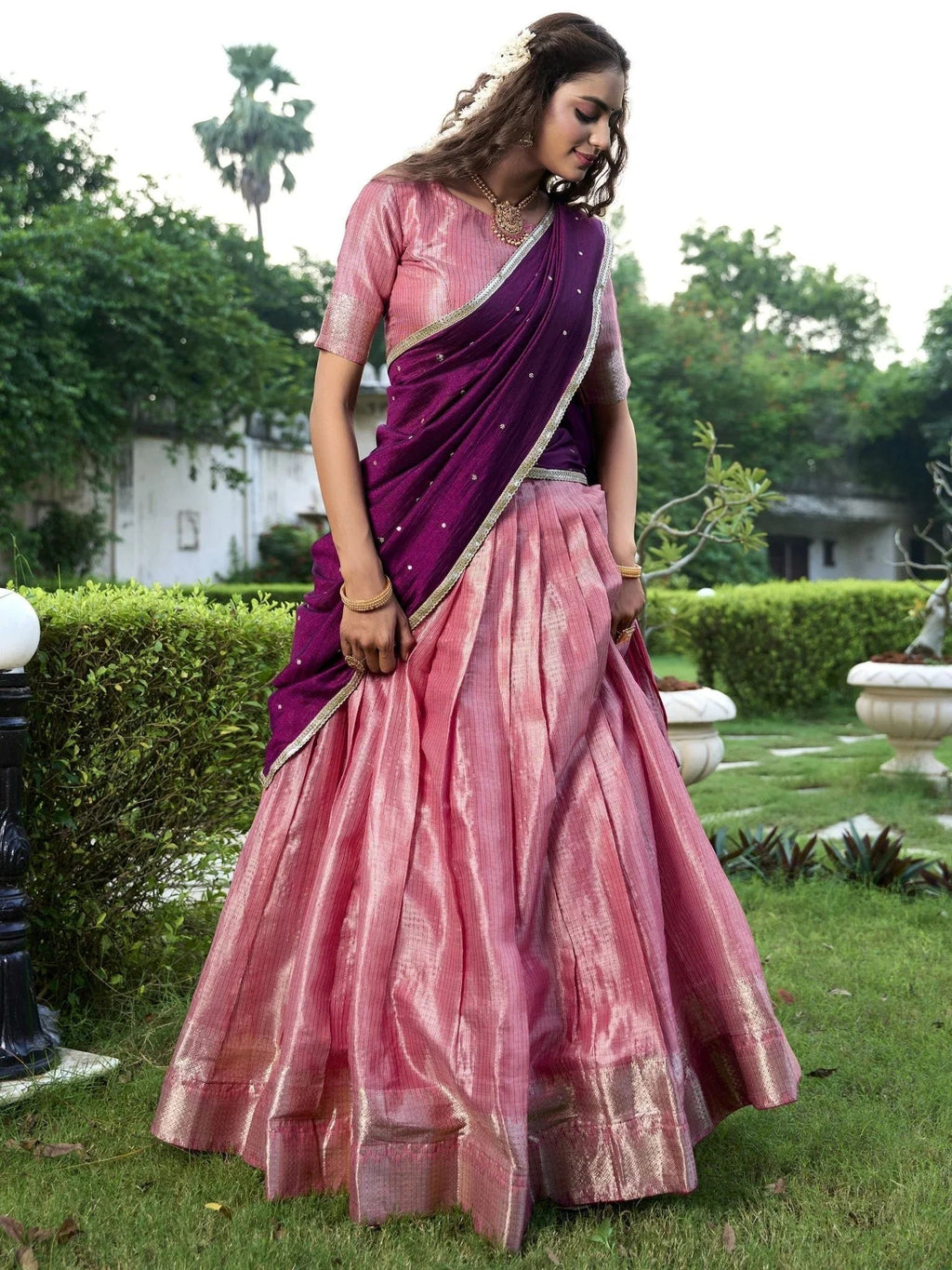 Pink kanchipuram silk lehenga choli with zari weaving and sequins embroidery