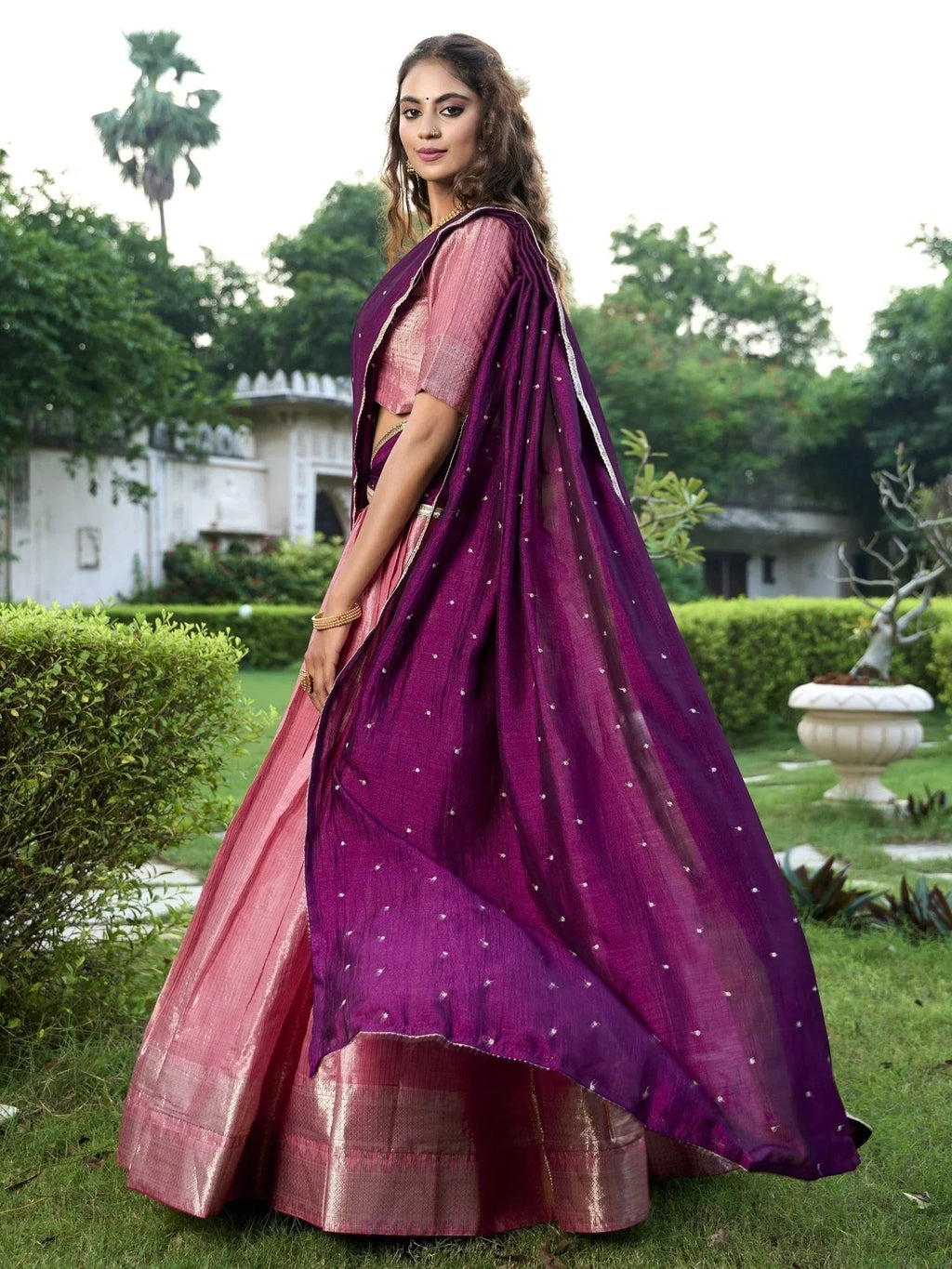 Pink kanchipuram silk lehenga choli with zari weaving and sequins embroidery