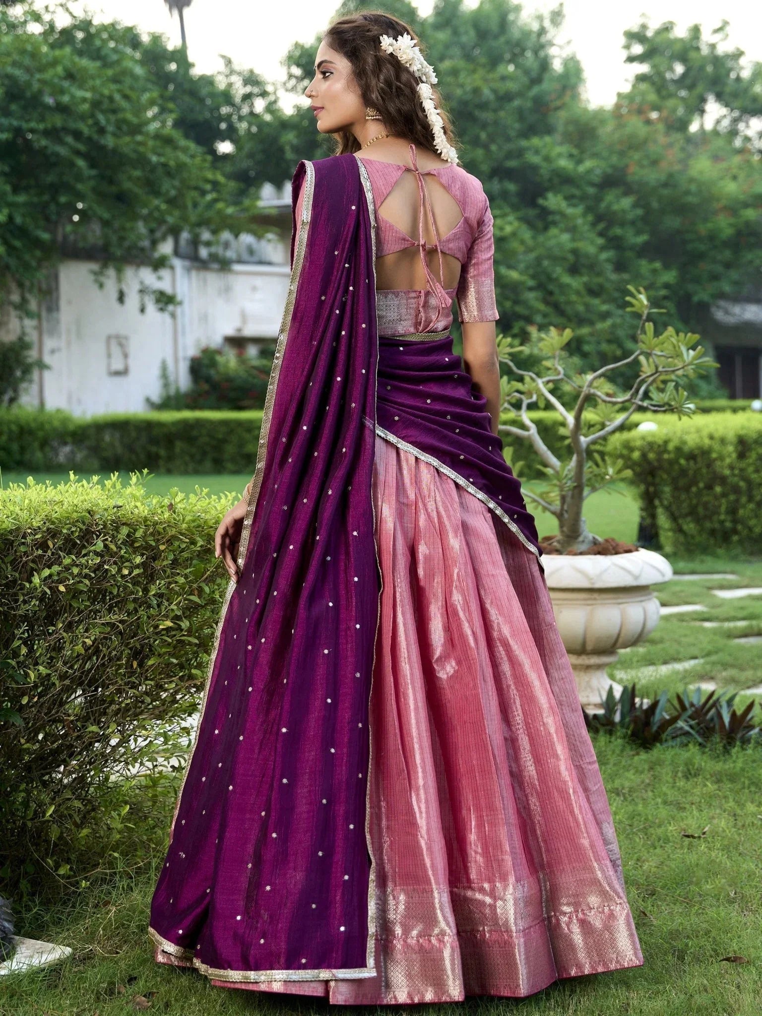 Pink kanchipuram silk lehenga choli with zari weaving and sequins embroidery