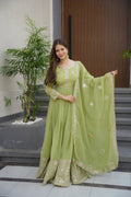 Pista green crunchy silk gown with embroidered sequins work and dupatta