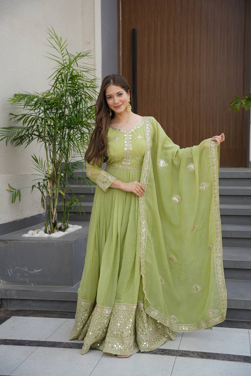 Pista green crunchy silk gown with embroidered sequins work and dupatta
