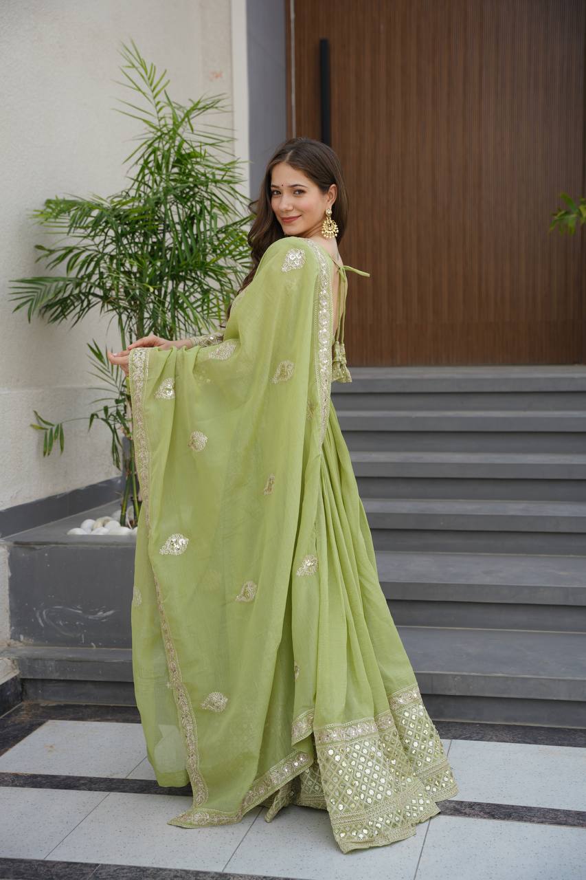 Pista green crunchy silk gown with embroidered sequins work and dupatta