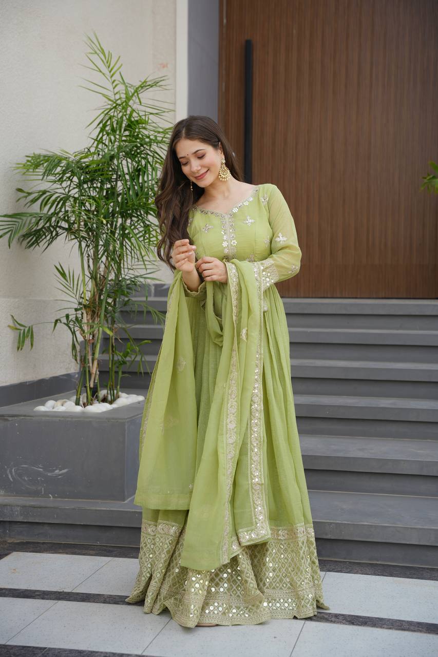 Pista green crunchy silk gown with embroidered sequins work and dupatta