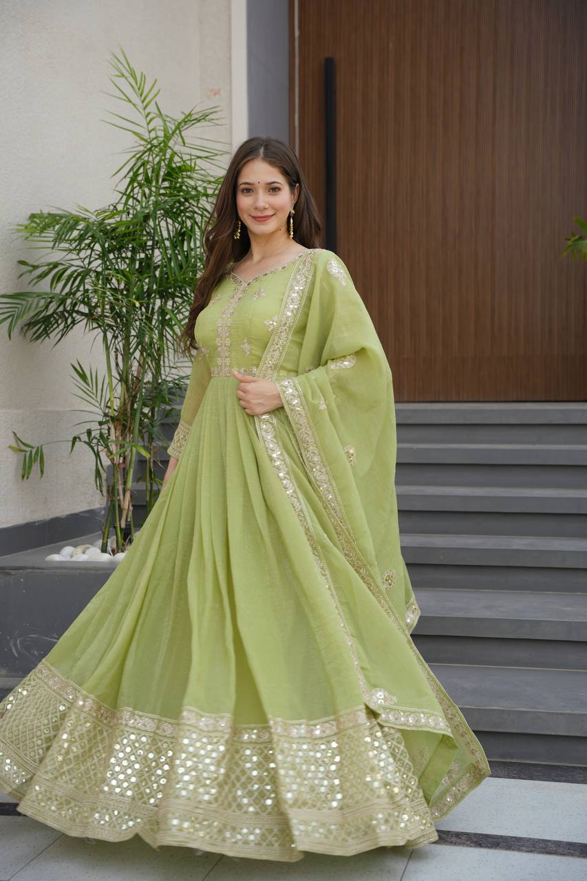 Pista green crunchy silk gown with embroidered sequins work and dupatta