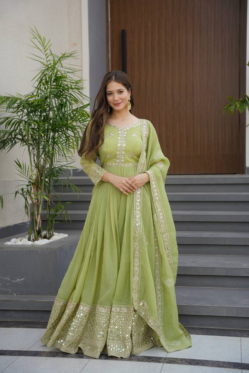 Pista green crunchy silk gown with embroidered sequins work and dupatta