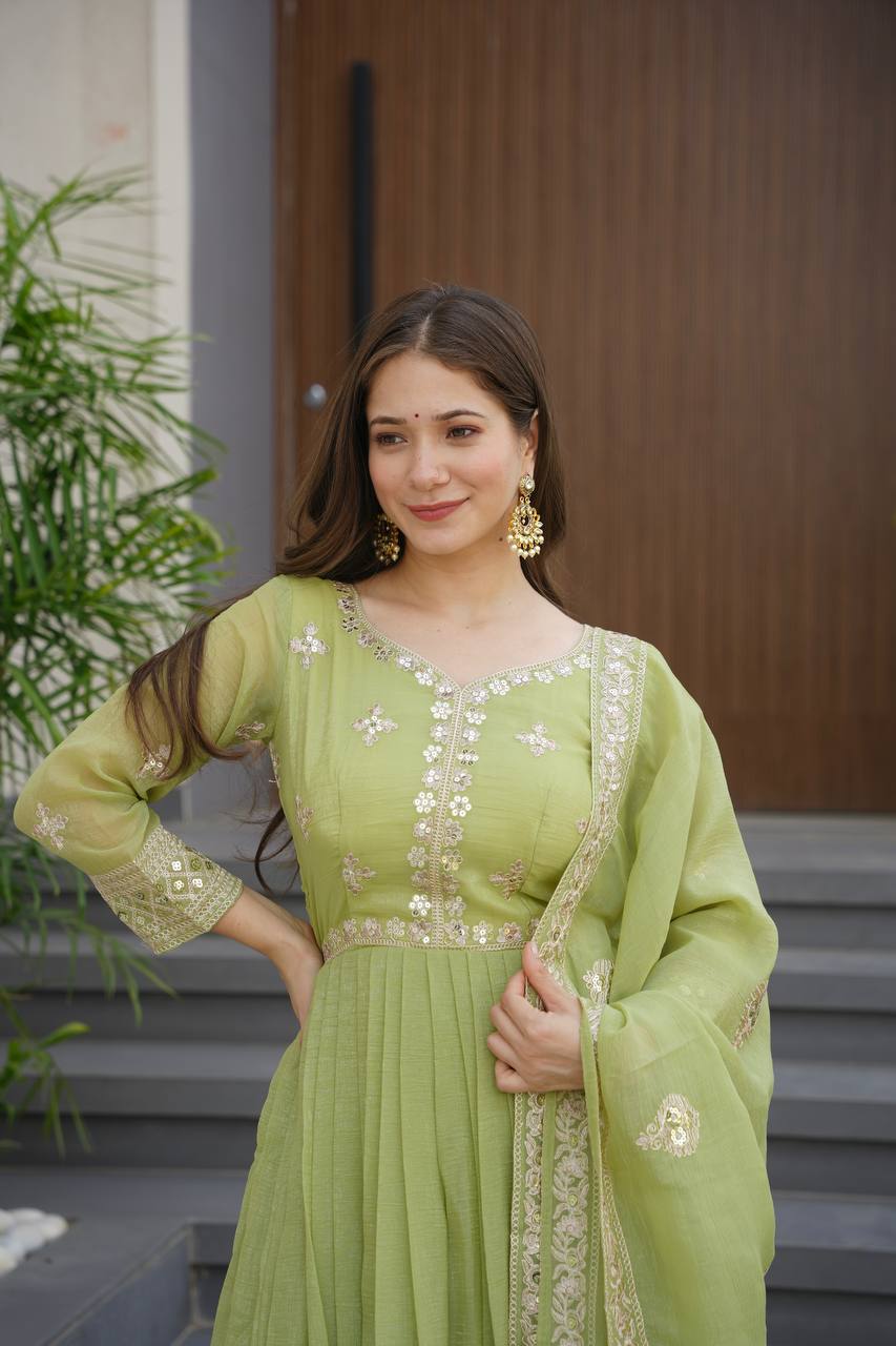 Pista green crunchy silk gown with embroidered sequins work and dupatta