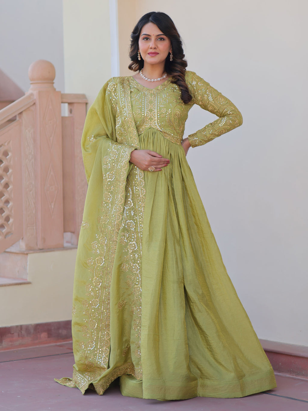 Pista green organza gown with sequins embroidery and dupatta