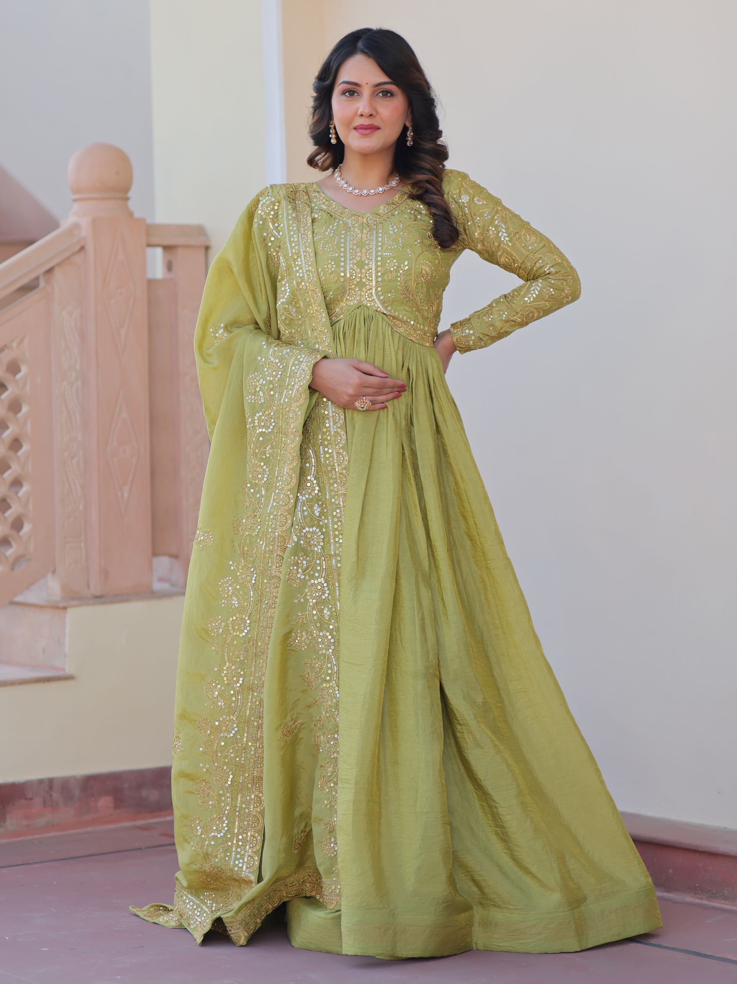 Pista green organza gown with sequins embroidery and dupatta