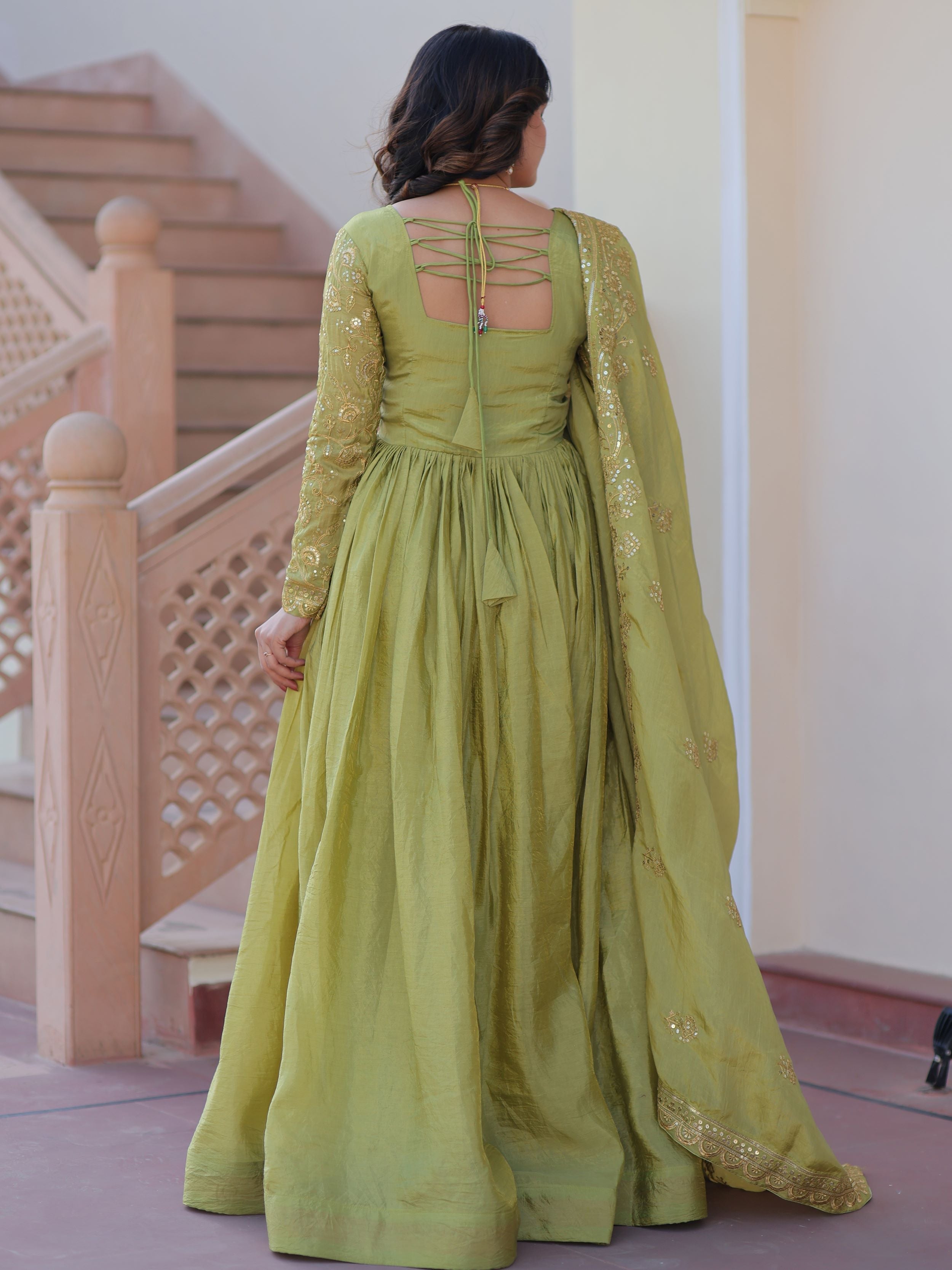 Pista green organza gown with sequins embroidery and dupatta