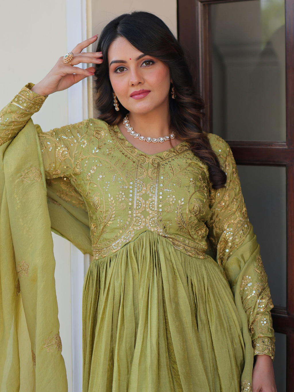Pista green organza gown with sequins embroidery and dupatta
