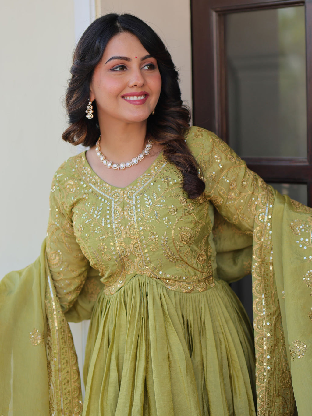 Pista green organza gown with sequins embroidery and dupatta