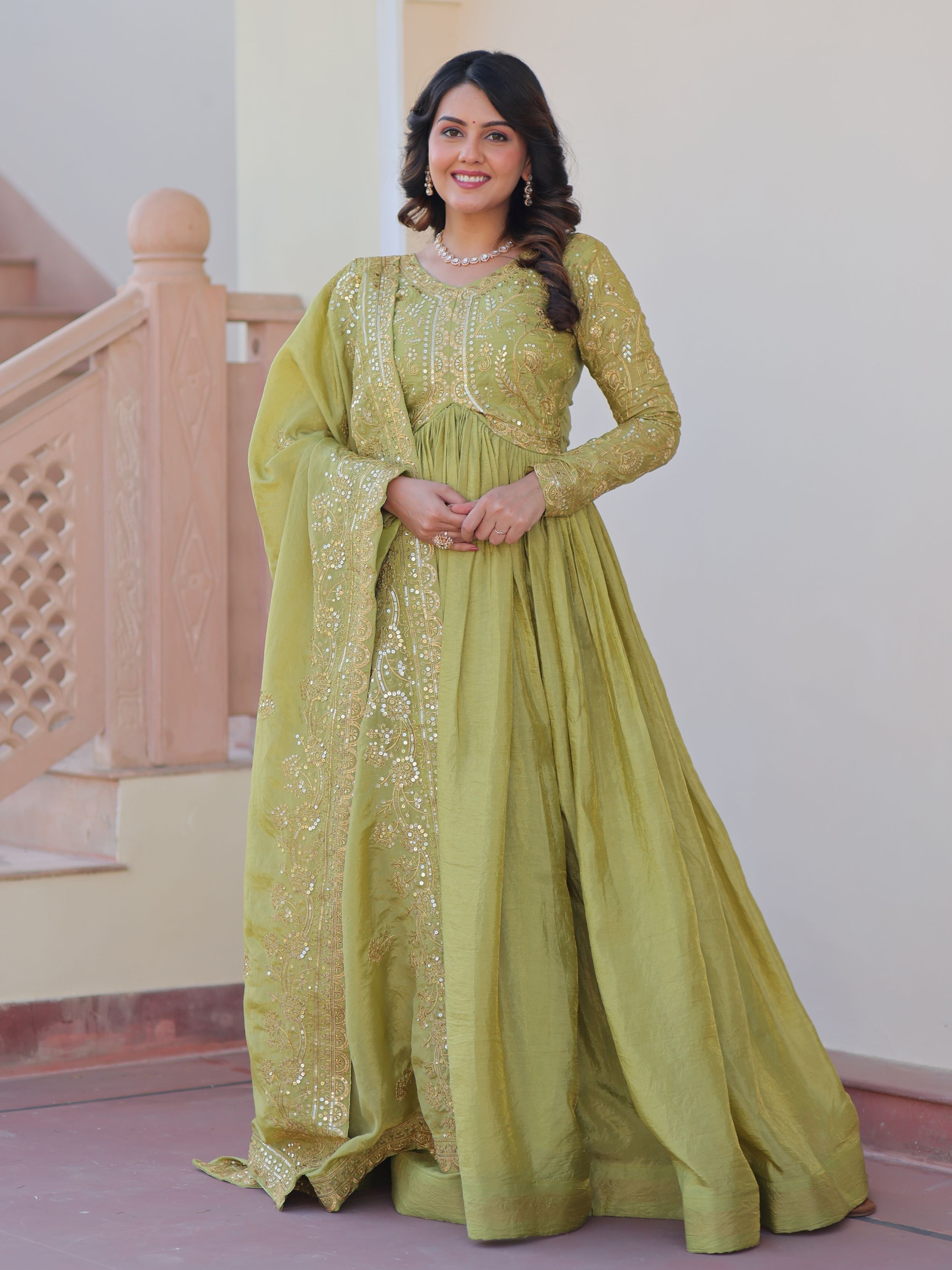 Pista green organza gown with sequins embroidery and dupatta