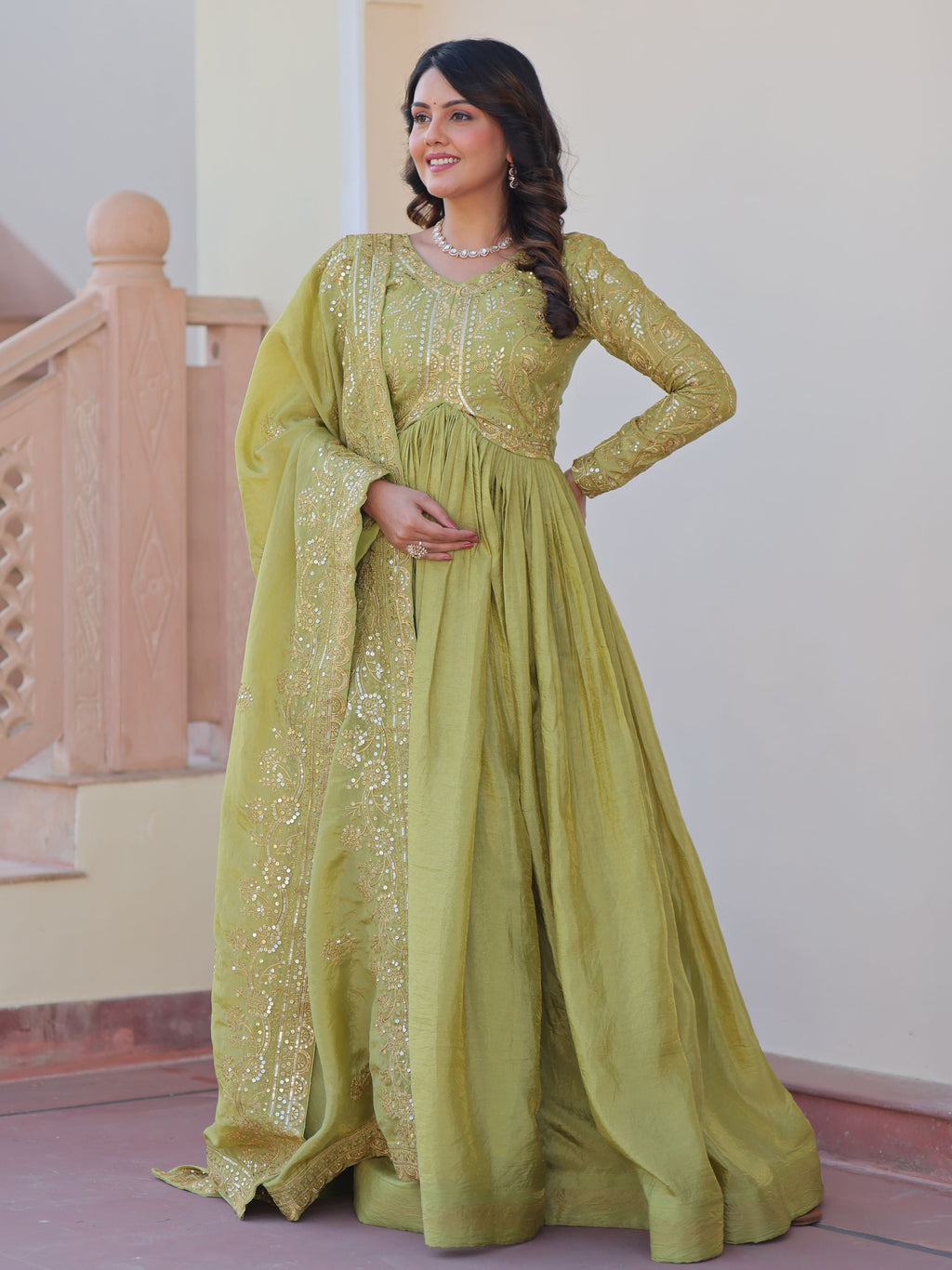 Pista green organza gown with sequins embroidery and dupatta