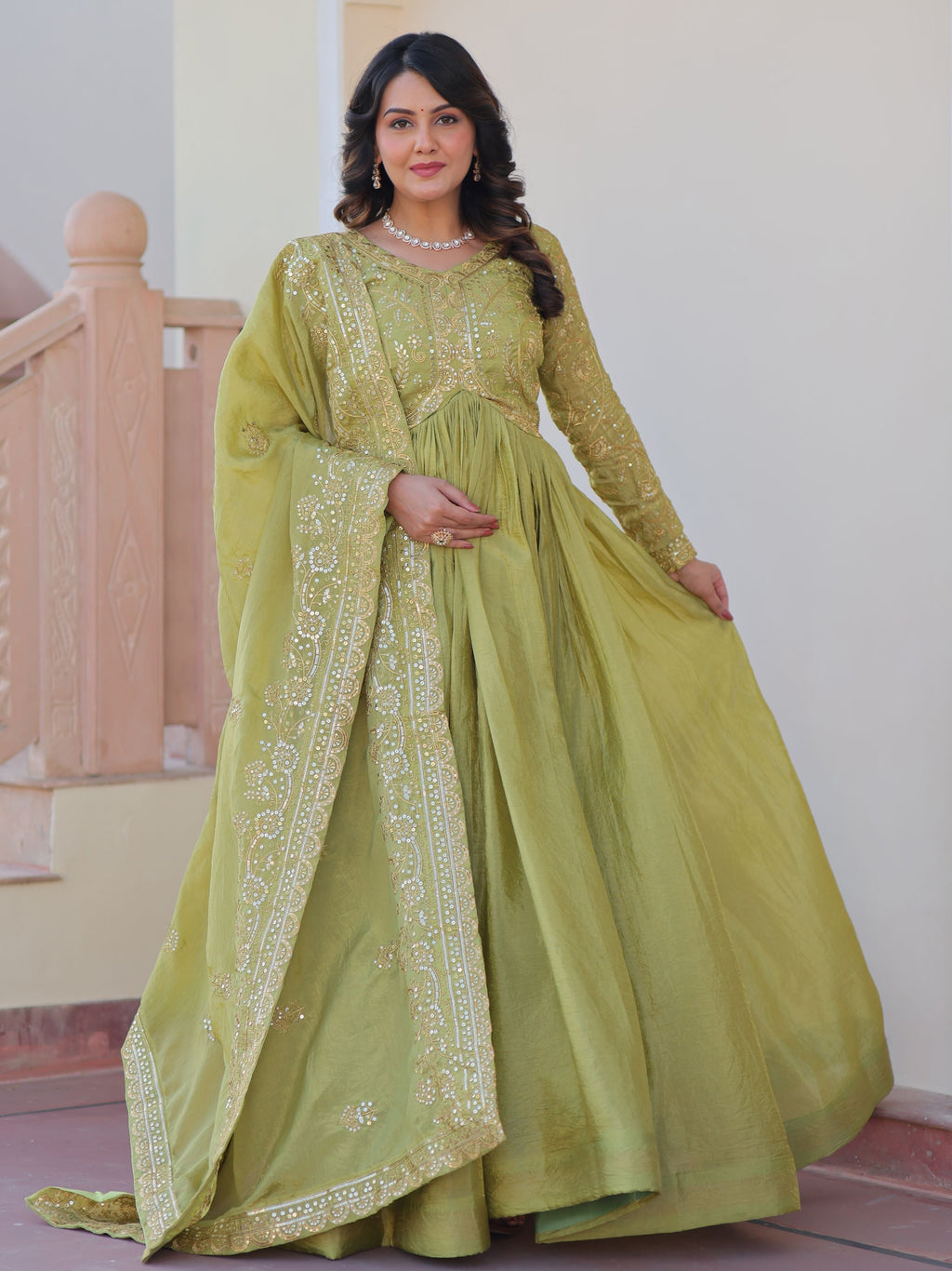 Pista green organza gown with sequins embroidery and dupatta