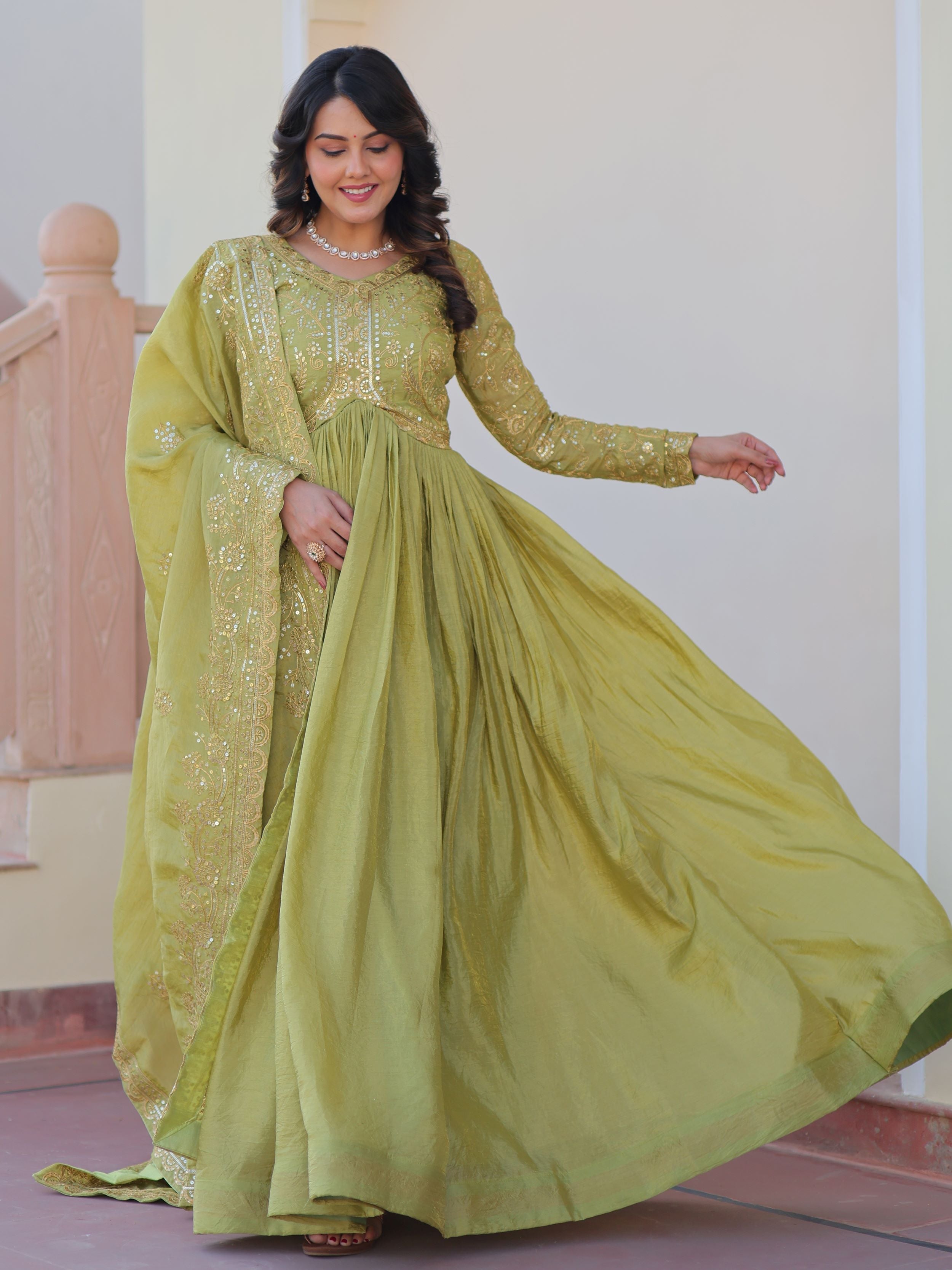 Pista green organza gown with sequins embroidery and dupatta