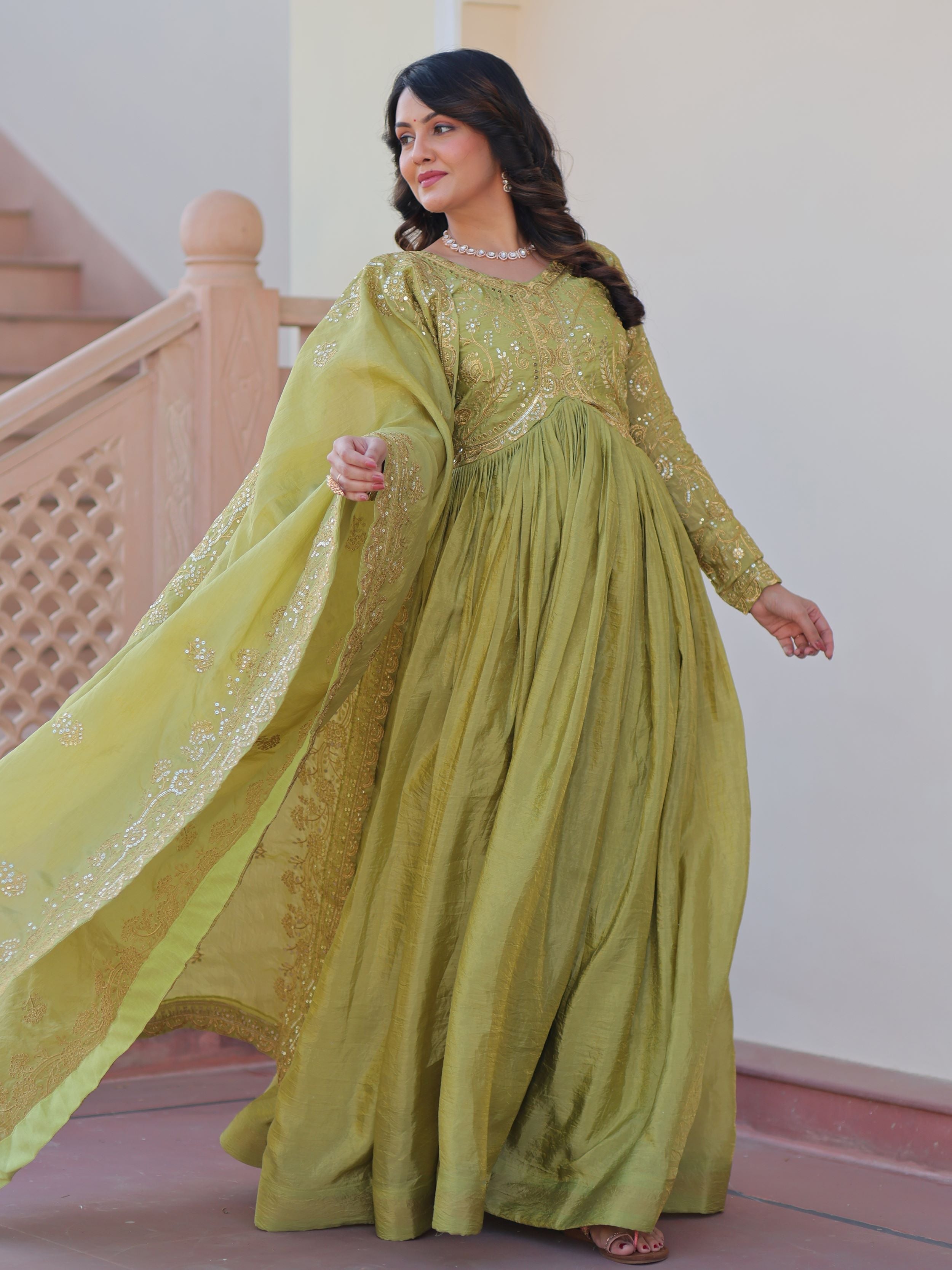 Pista green organza gown with sequins embroidery and dupatta