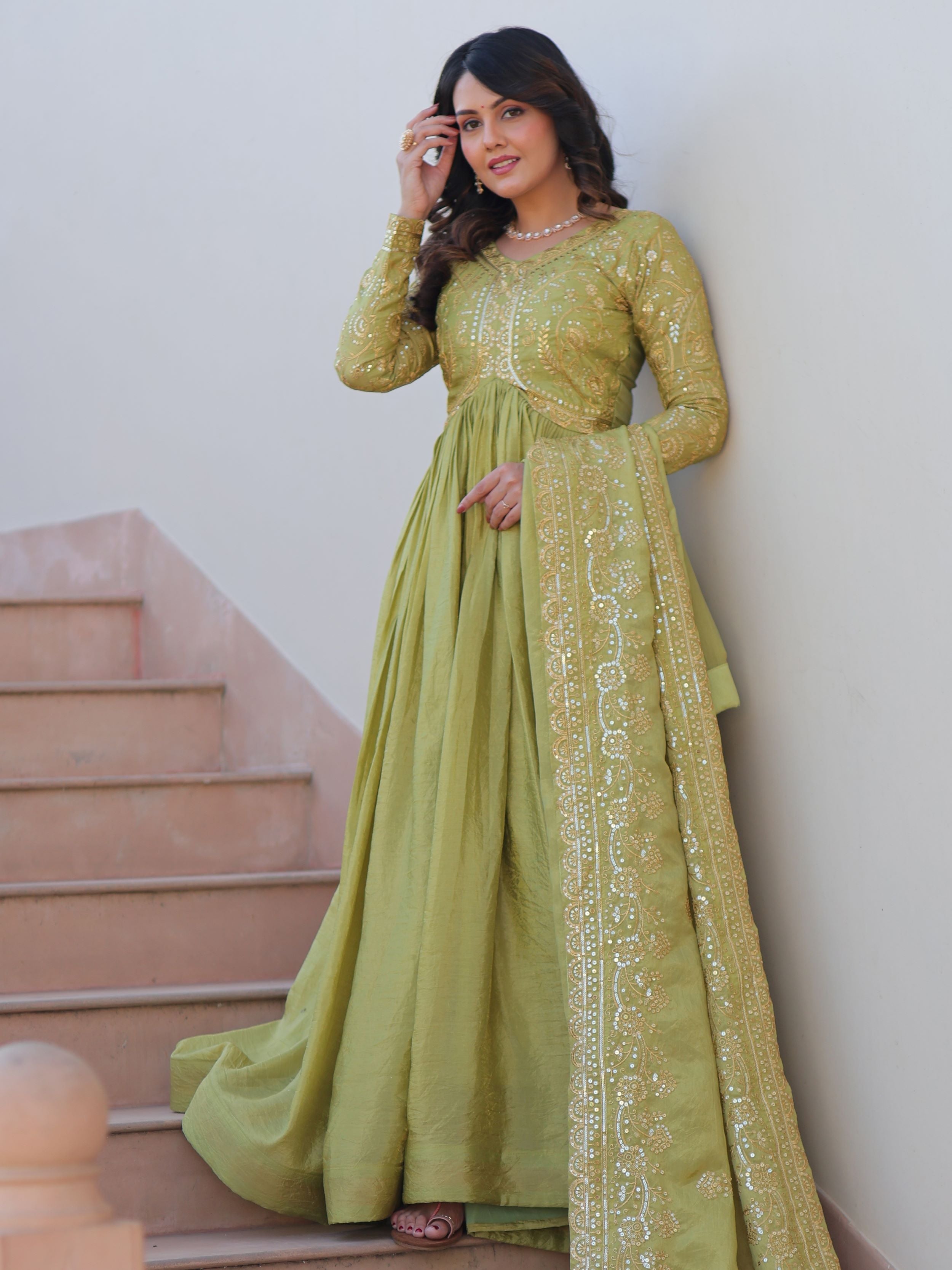 Pista green organza gown with sequins embroidery and dupatta