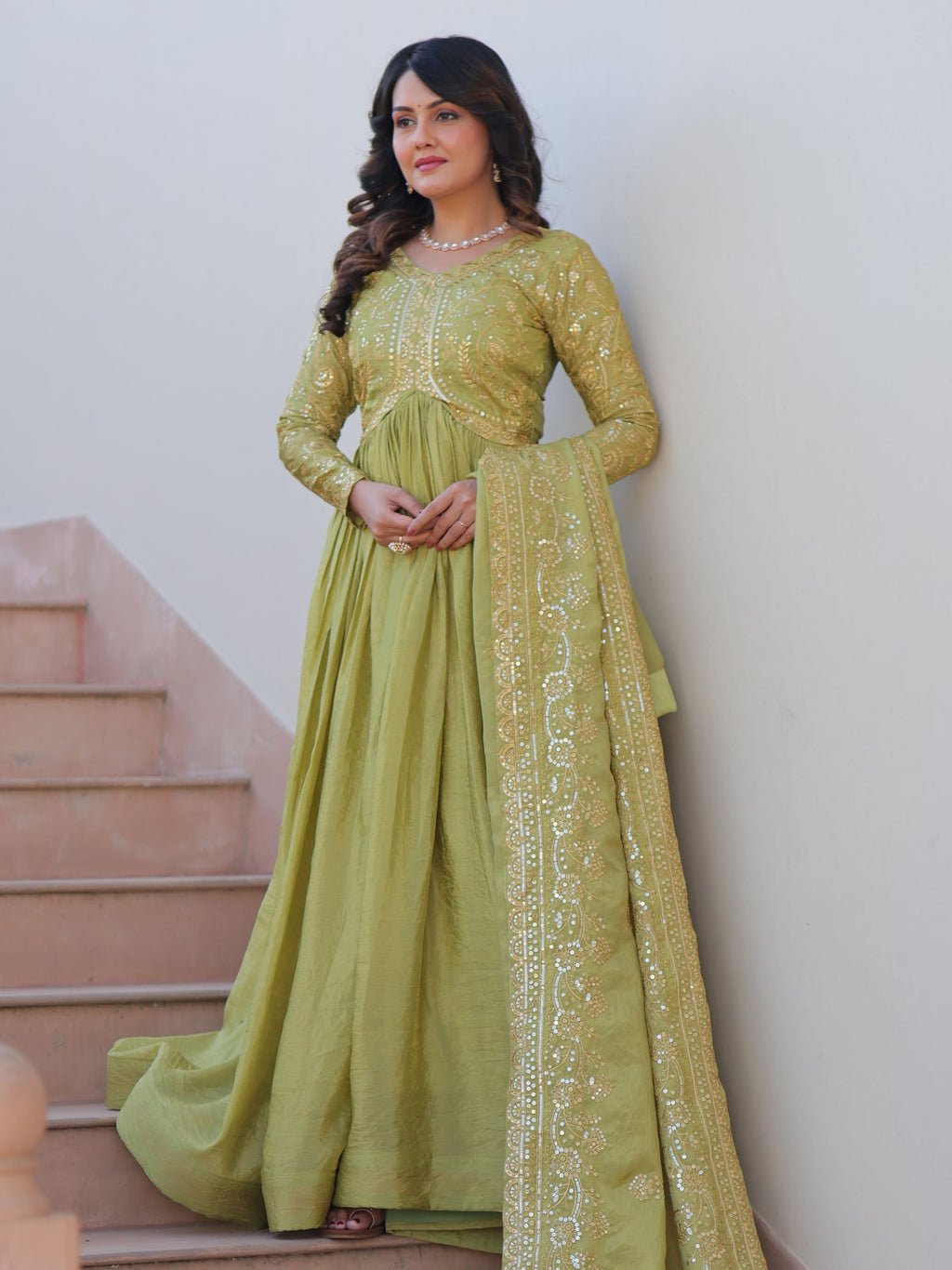 Pista green organza gown with sequins embroidery and dupatta