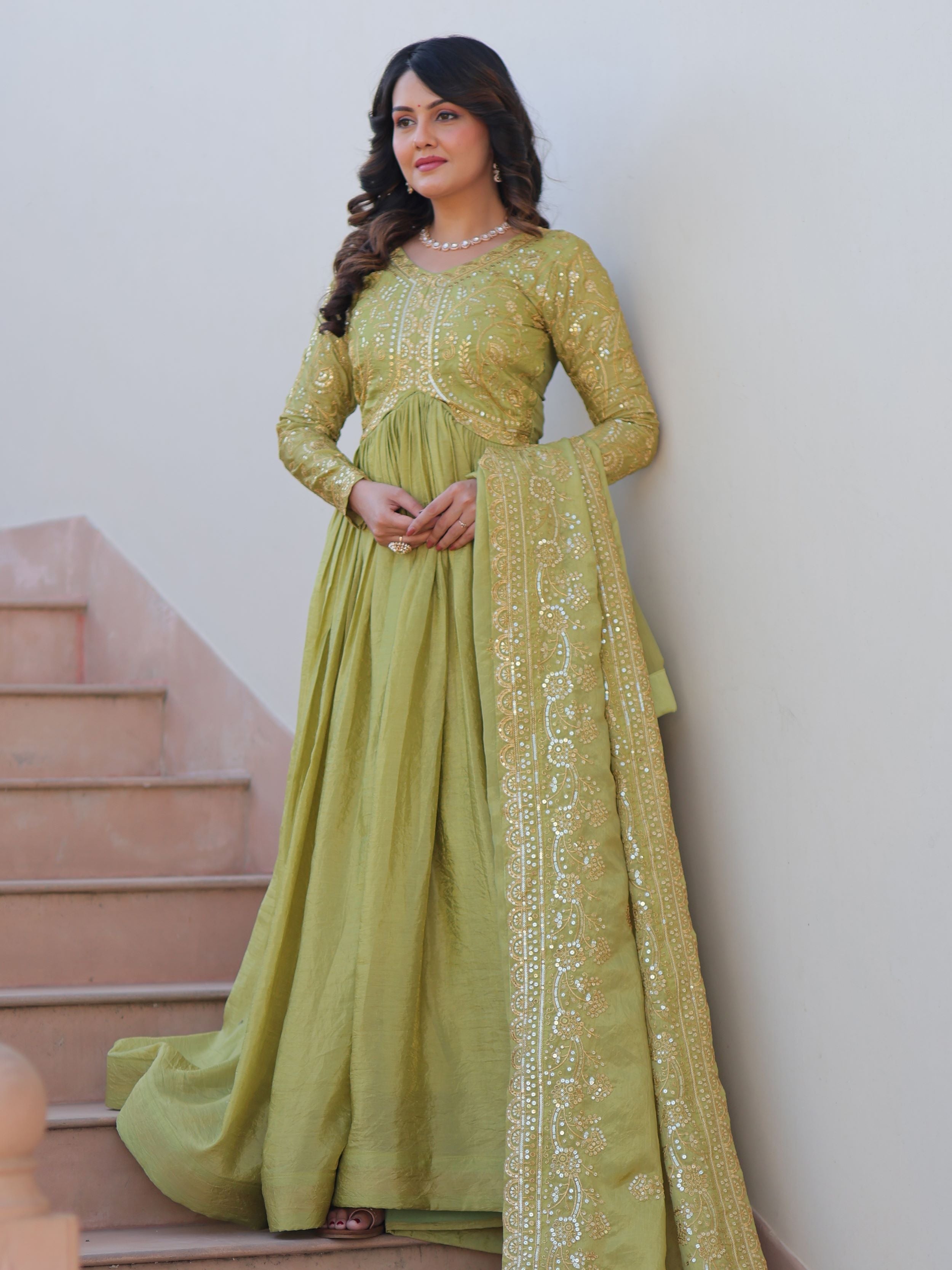 Pista green organza gown with sequins embroidery and dupatta