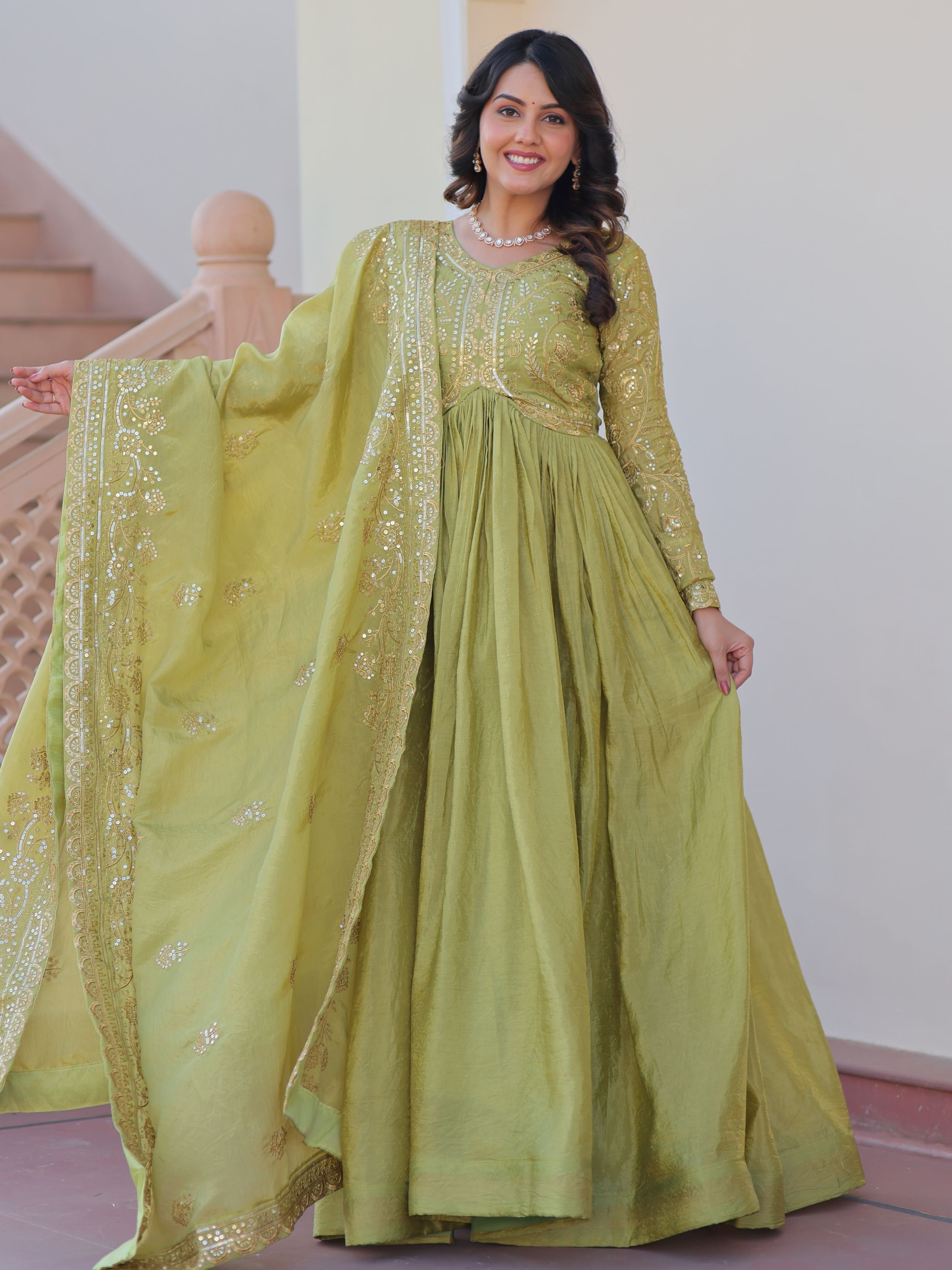 Pista green organza gown with sequins embroidery and dupatta