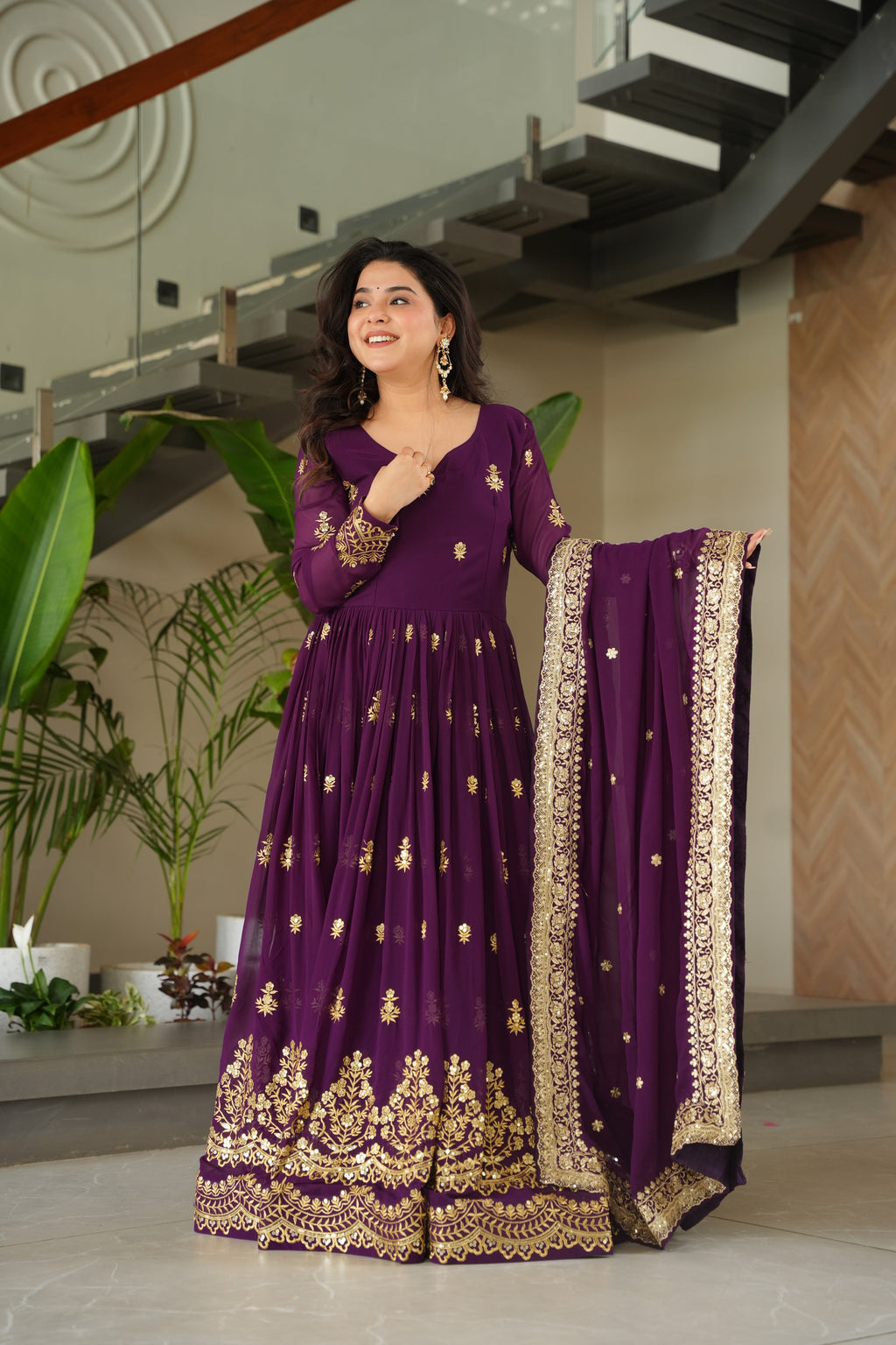 Rishita purple faux blooming zari sequins embroidered gown with dupatta